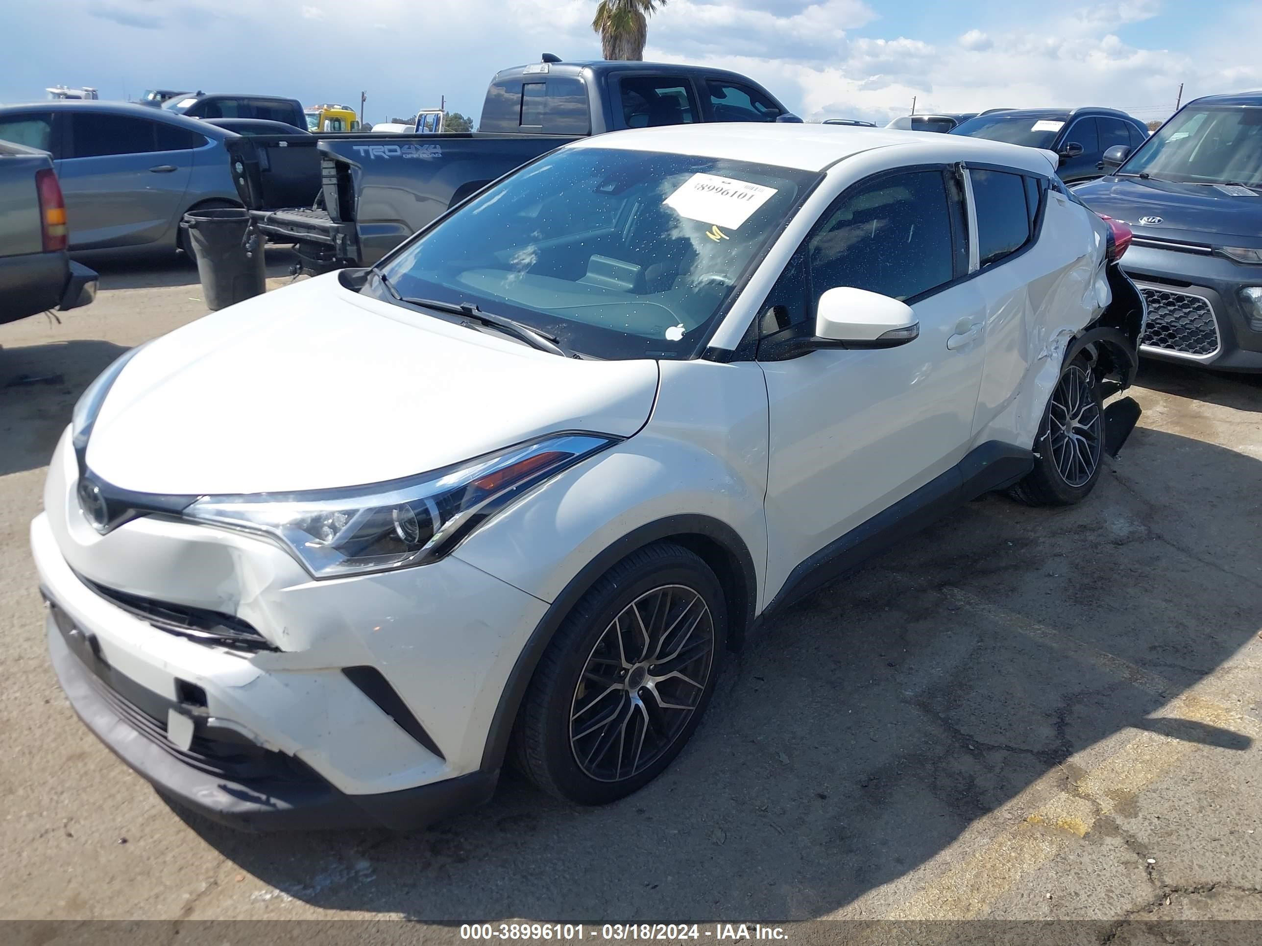 Photo 1 VIN: JTNKHMBX5K1028307 - TOYOTA C-HR 