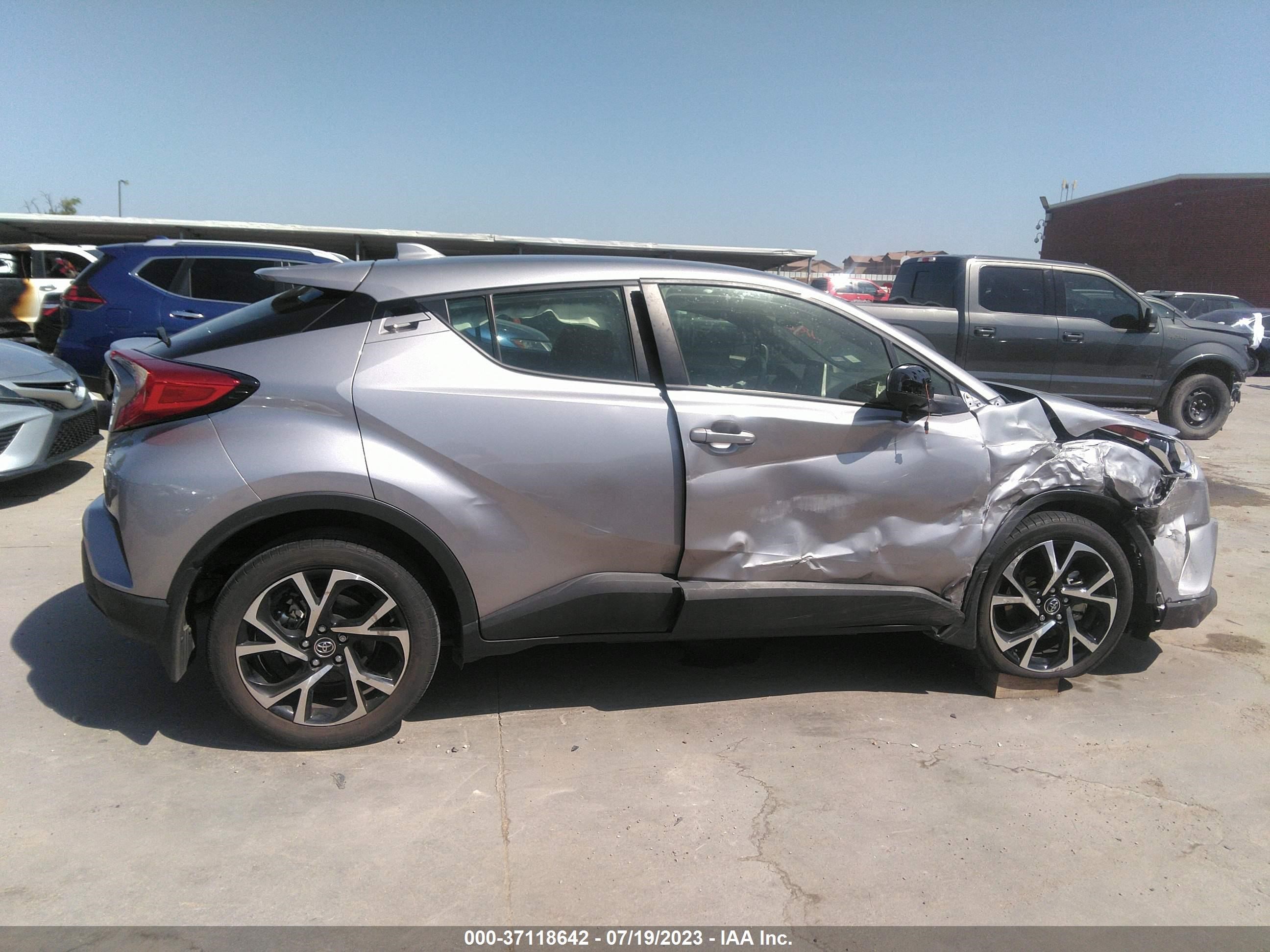 Photo 12 VIN: JTNKHMBX5K1057239 - TOYOTA C-HR 