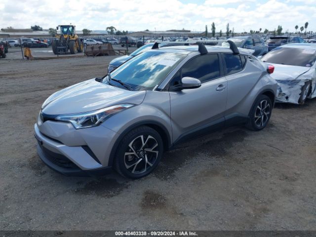 Photo 1 VIN: JTNKHMBX9J1008849 - TOYOTA C-HR 