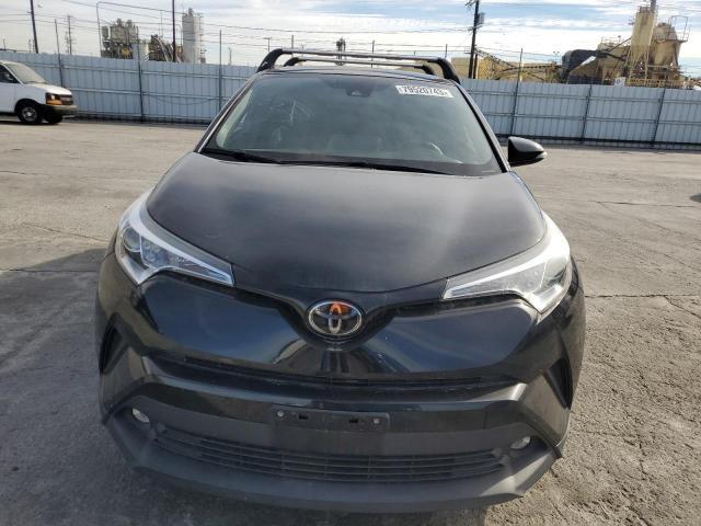 Photo 4 VIN: JTNKHMBX9K1032599 - TOYOTA C-HR XLE 