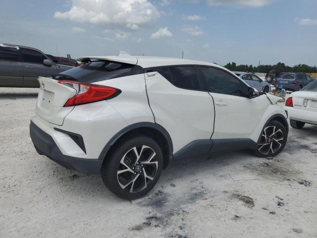 Photo 2 VIN: JTNKHMBXXJ1000761 - TOYOTA C-HR XLE 