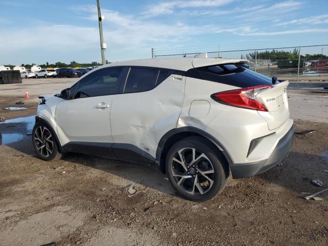 Photo 1 VIN: JTNKHMBXXK1060797 - TOYOTA C-HR XLE 