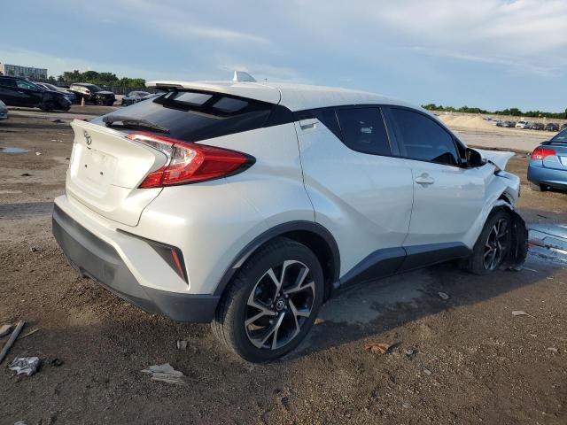 Photo 2 VIN: JTNKHMBXXK1060797 - TOYOTA C-HR XLE 