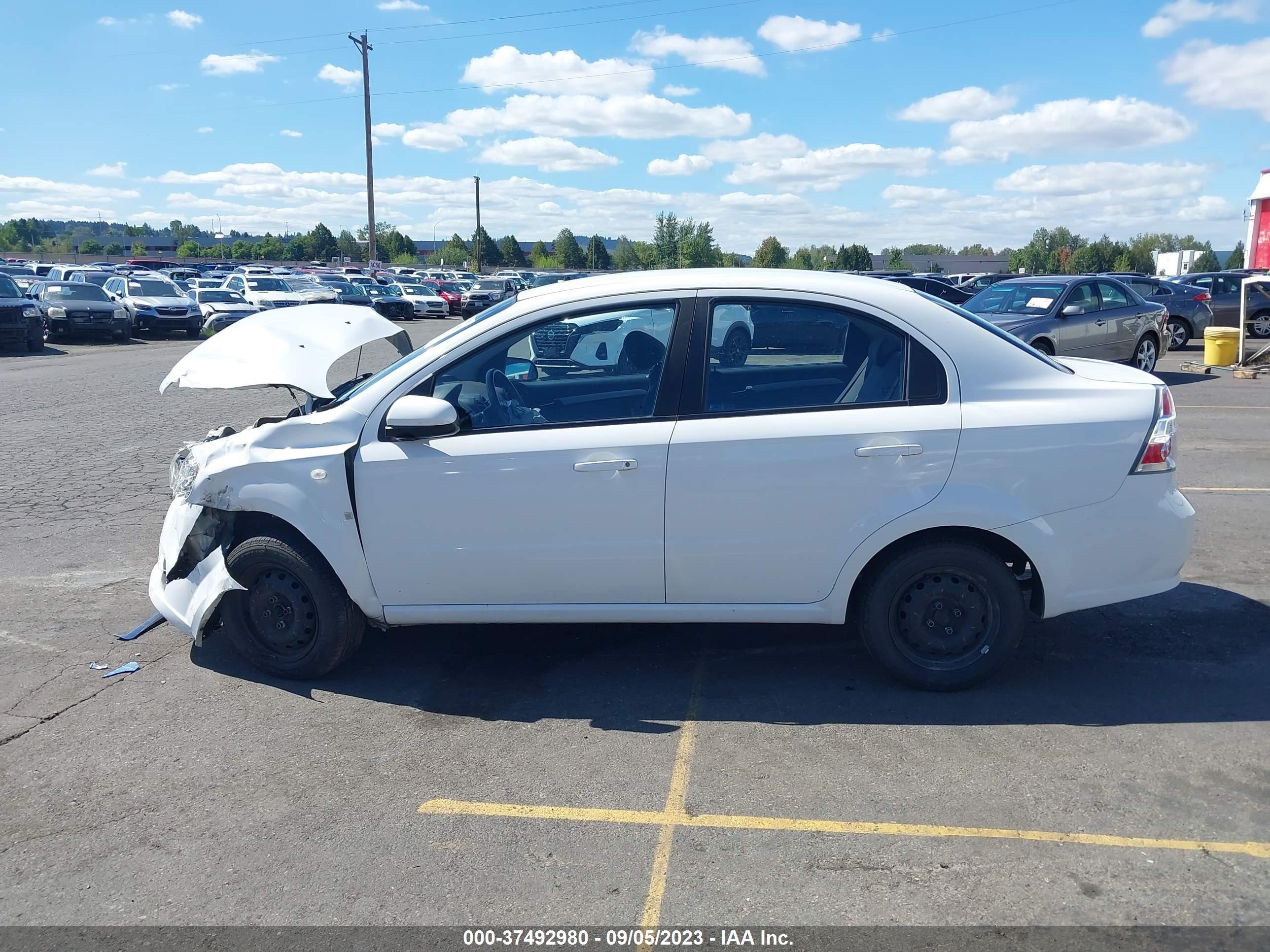 Photo 13 VIN: KL1TD56618B045143 - CHEVROLET AVEO 