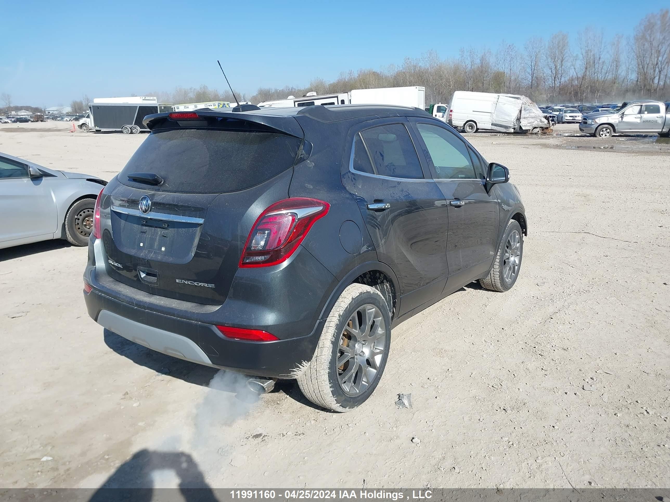 Photo 3 VIN: KL4CJ1SM9JB528183 - BUICK ENCORE 