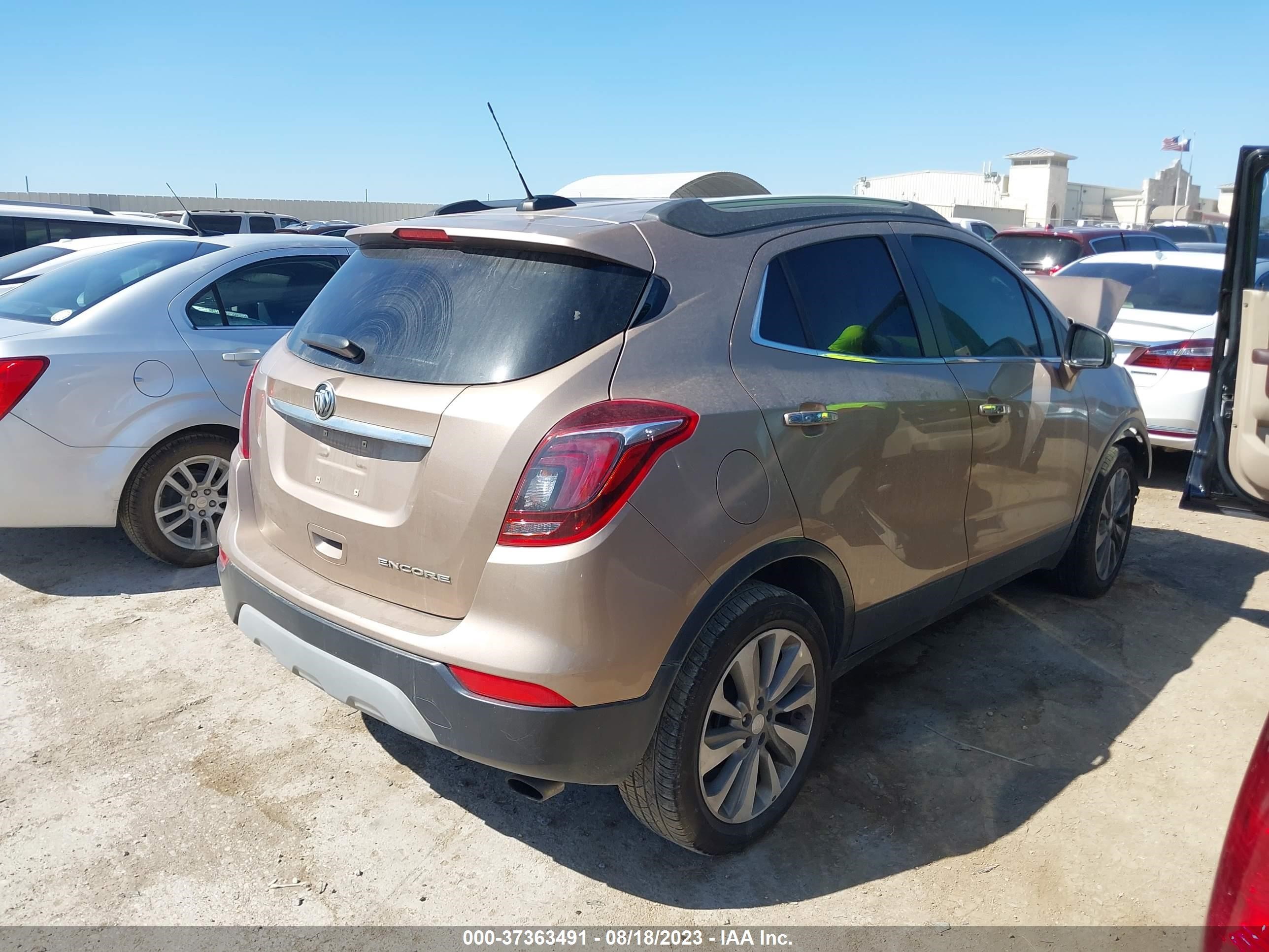 Photo 3 VIN: KL4CJASB0KB879662 - BUICK ENCORE 