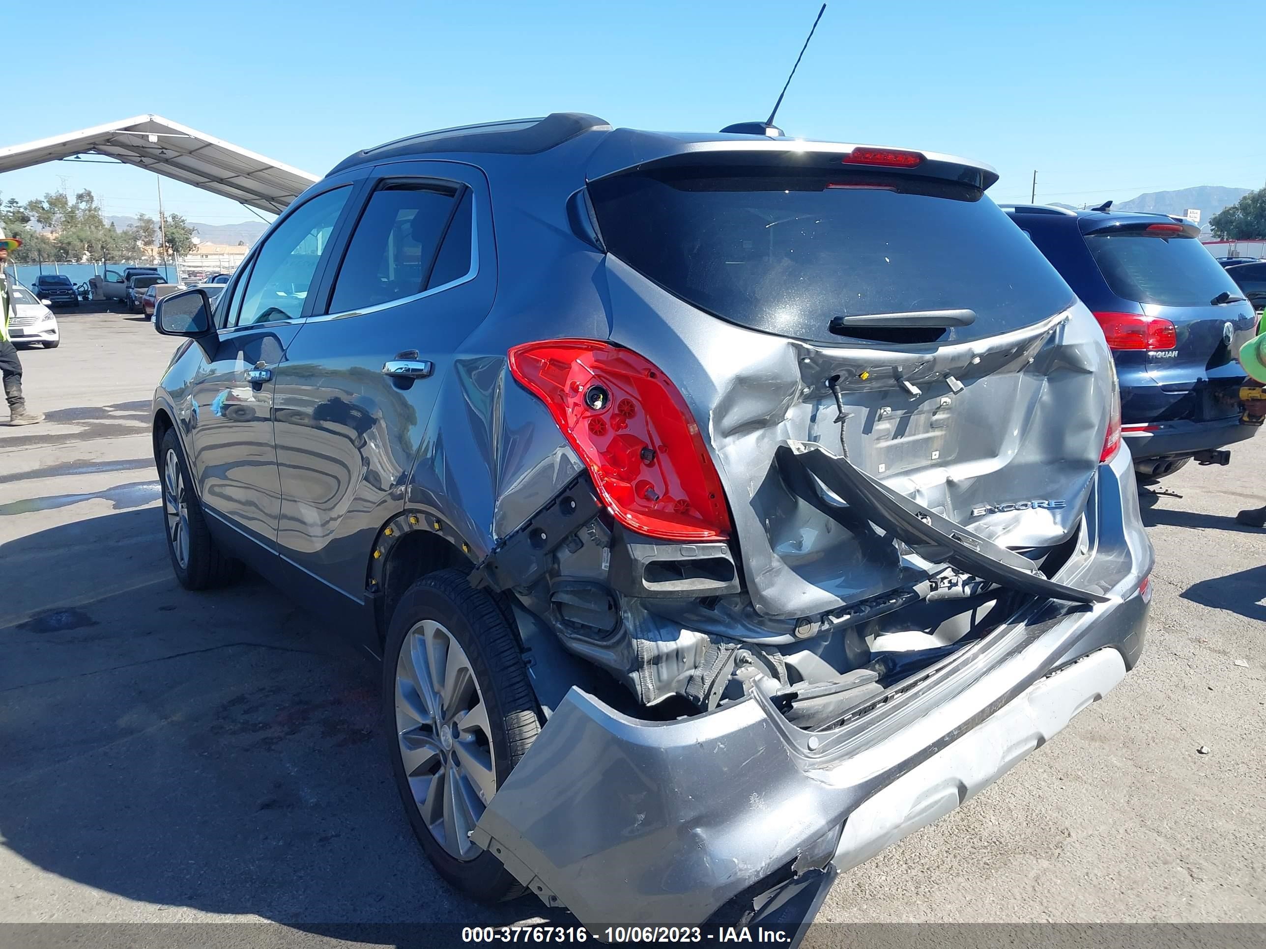 Photo 2 VIN: KL4CJASB2KB716625 - BUICK ENCORE 