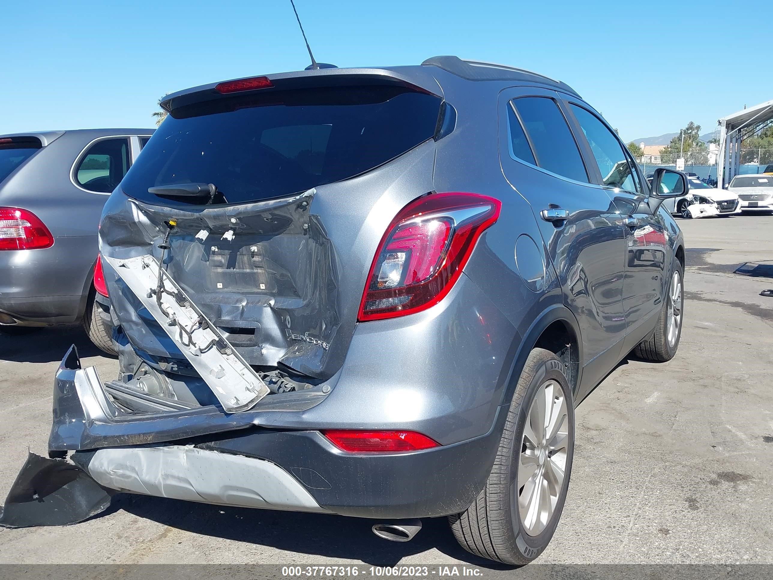 Photo 3 VIN: KL4CJASB2KB716625 - BUICK ENCORE 