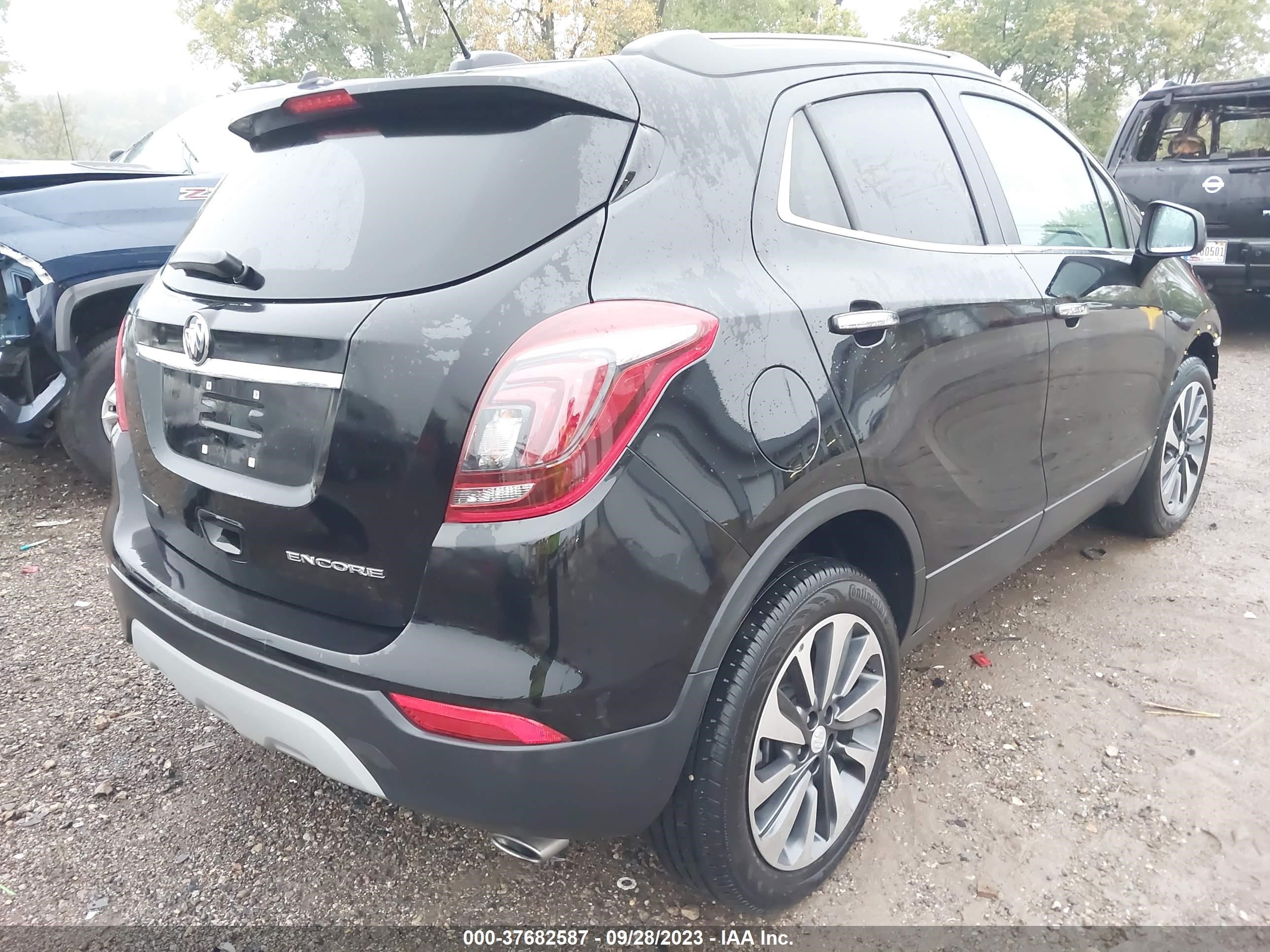 Photo 3 VIN: KL4CJASB2MB305678 - BUICK ENCORE 