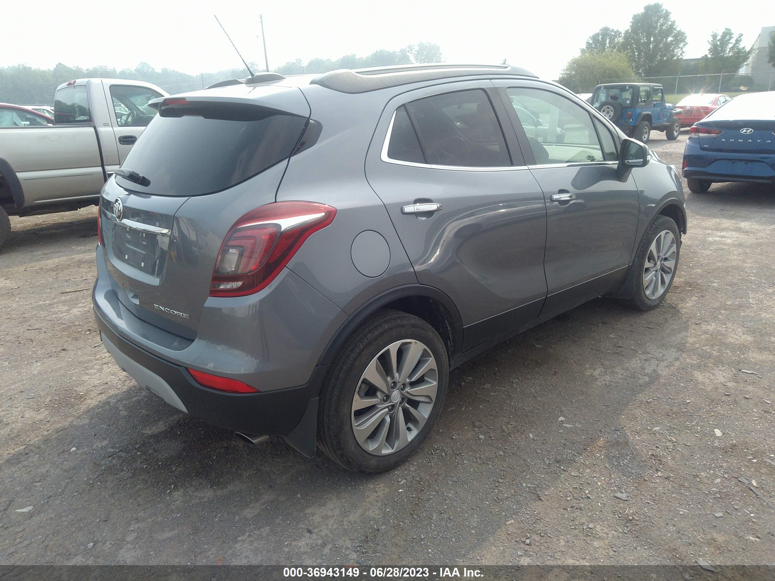 Photo 3 VIN: KL4CJASB6KB942411 - BUICK ENCORE 