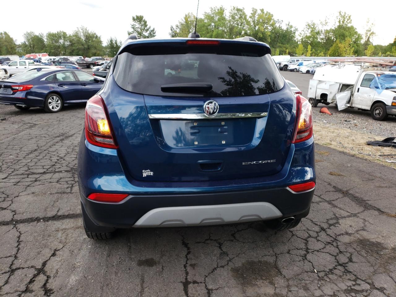 Photo 5 VIN: KL4CJASBXKB861718 - BUICK ENCORE 