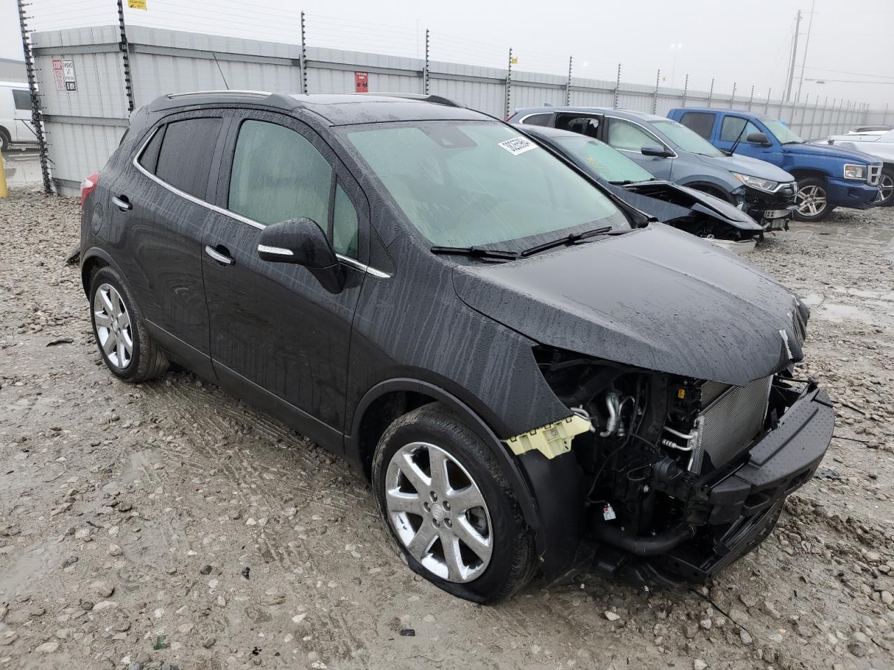 Photo 3 VIN: KL4CJDSBXHB140874 - BUICK ENCORE 