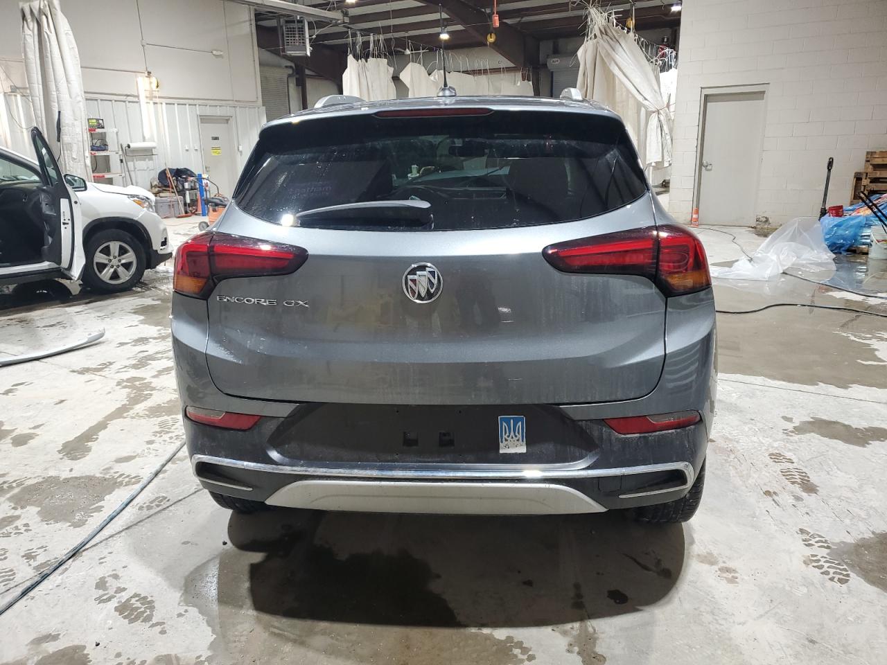 Photo 5 VIN: KL4MMFSLXMB086325 - BUICK ENCORE 