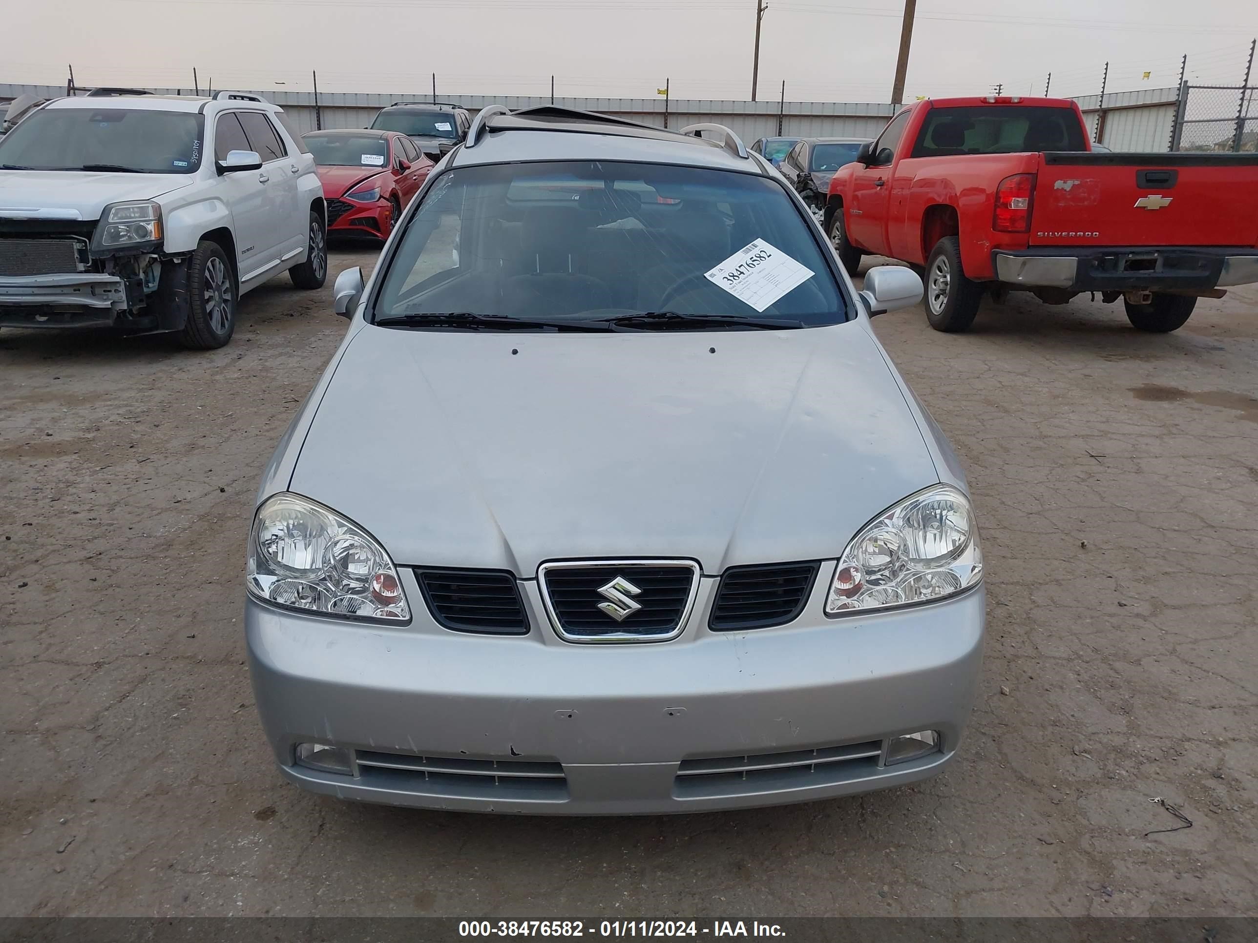 Photo 11 VIN: KL5JJ86Z05K076731 - SUZUKI FORENZA 