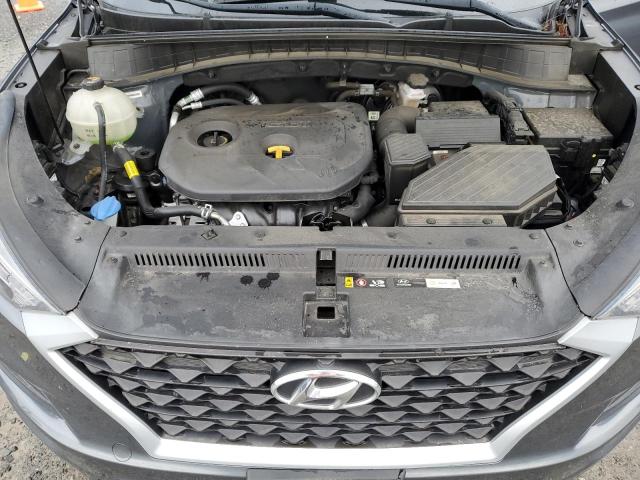 Photo 11 VIN: KM8J2CA43KU955979 - HYUNDAI TUCSON SE 