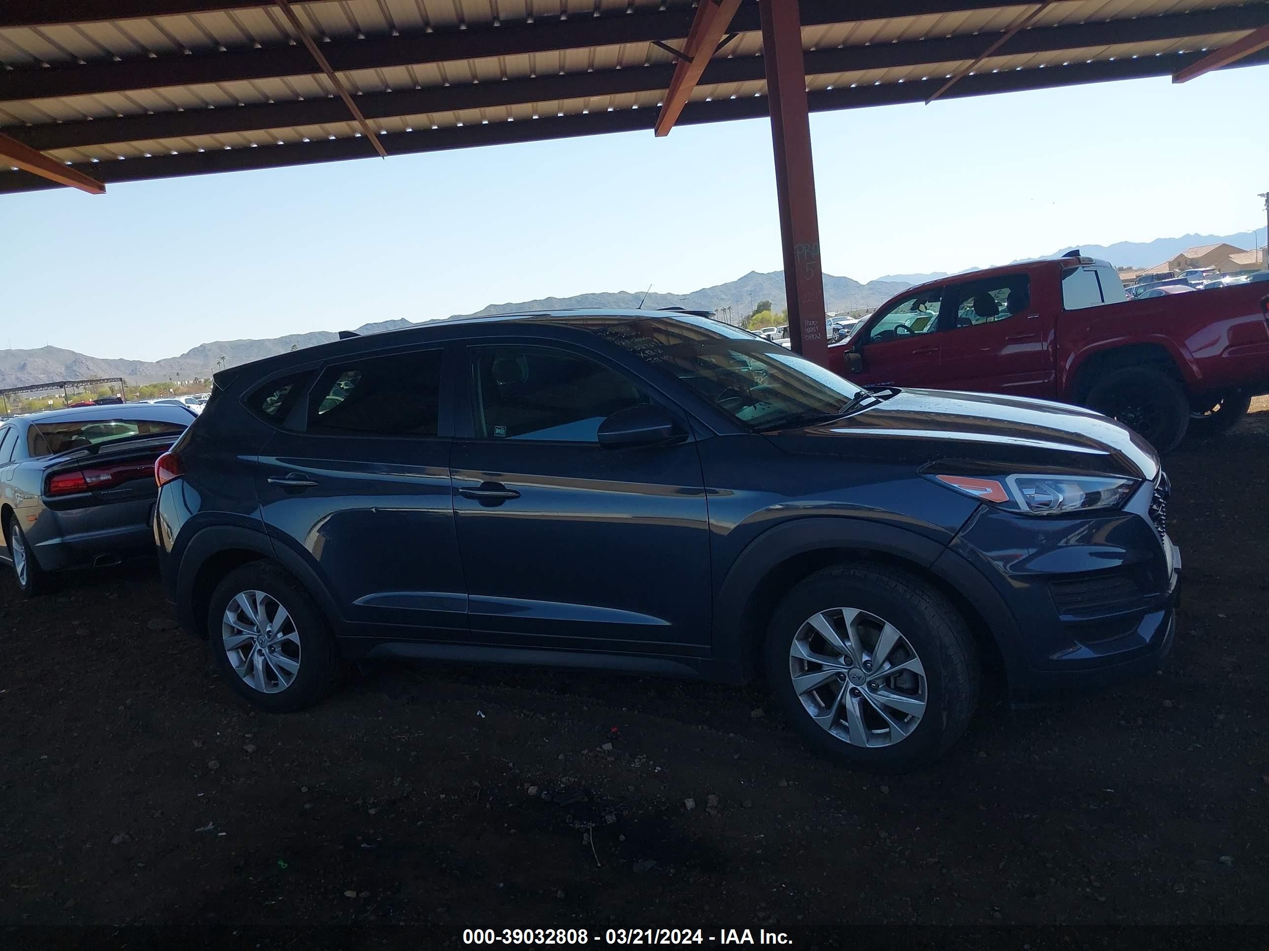 Photo 11 VIN: KM8J2CA45KU027672 - HYUNDAI TUCSON 