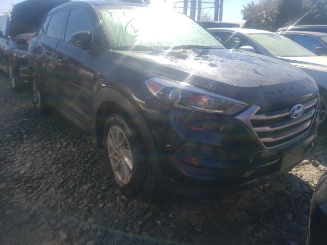 Photo 0 VIN: KM8J2CA47JU700248 - HYUNDAI TUCSON SE 