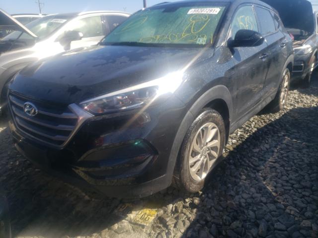 Photo 1 VIN: KM8J2CA47JU700248 - HYUNDAI TUCSON SE 