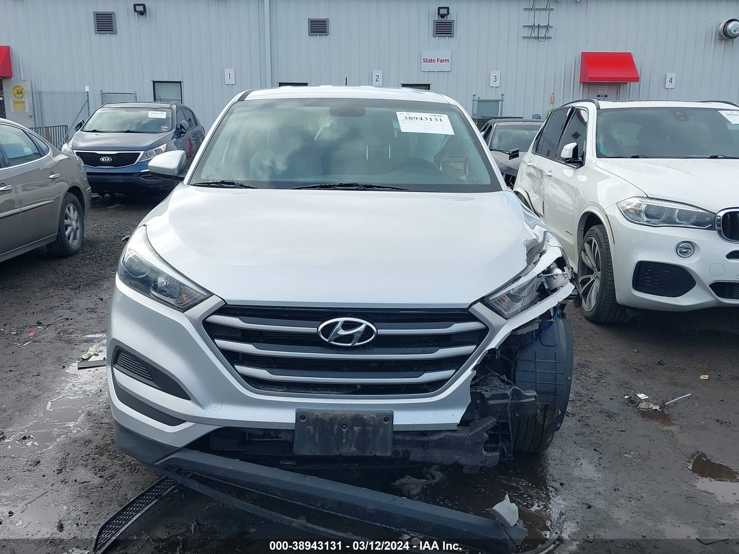 Photo 11 VIN: KM8J2CA47JU717504 - HYUNDAI TUCSON 