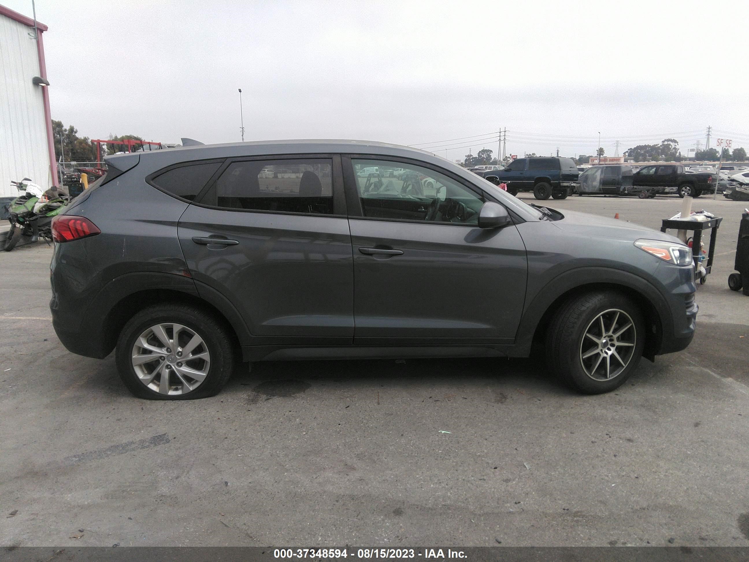 Photo 12 VIN: KM8J2CA49KU883539 - HYUNDAI TUCSON 