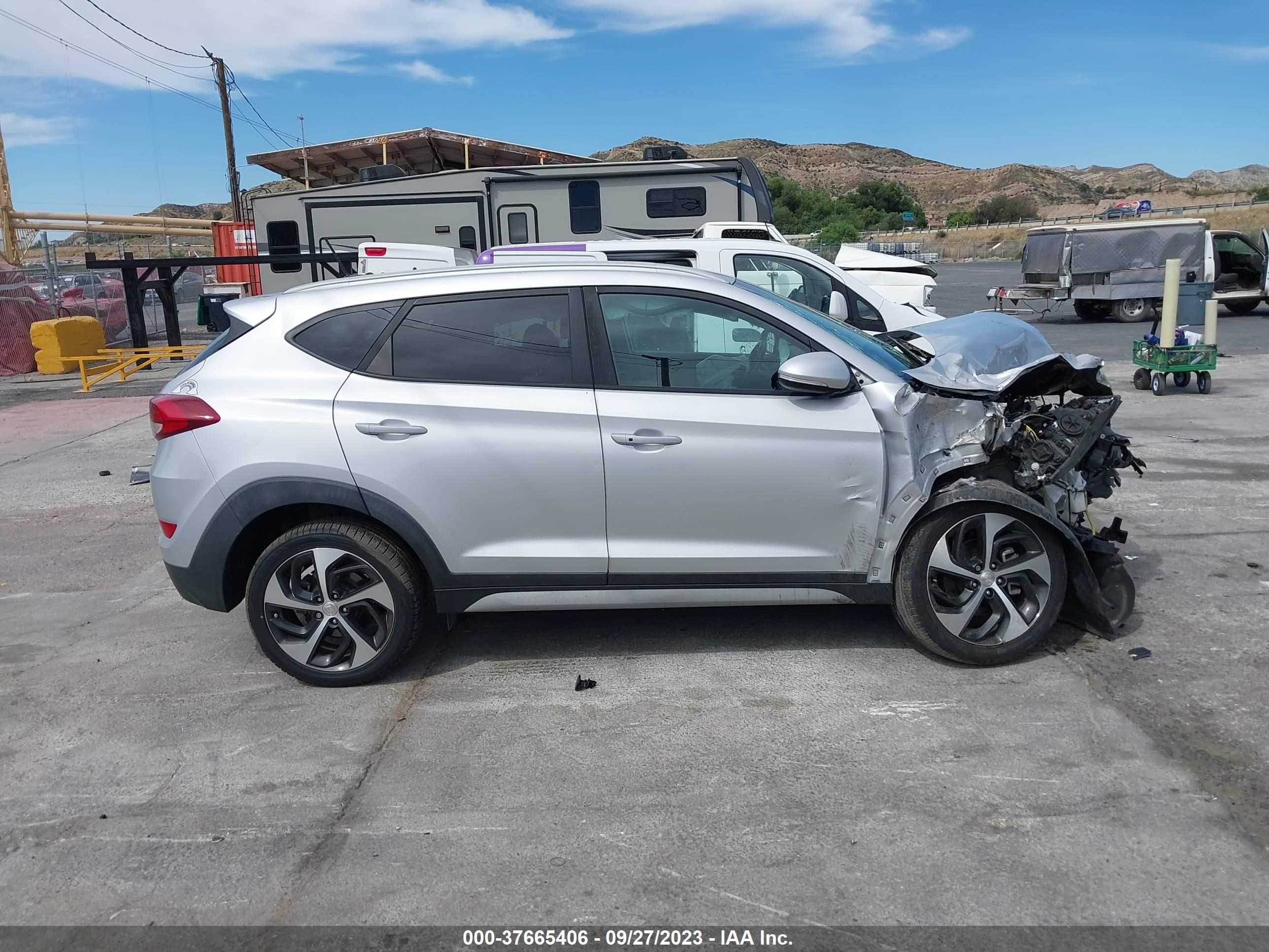 Photo 12 VIN: KM8J33A21HU486590 - HYUNDAI TUCSON 