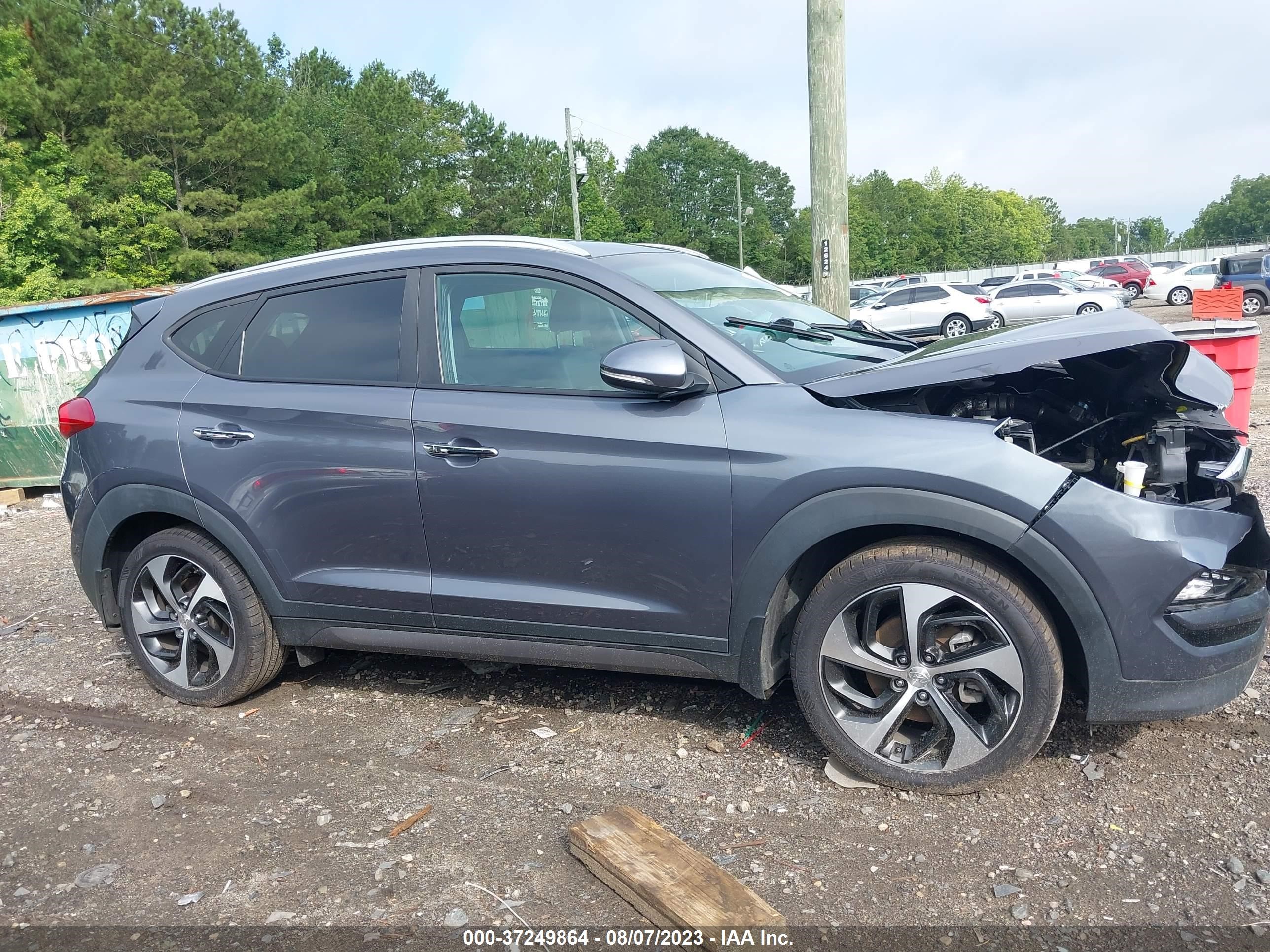 Photo 11 VIN: KM8J33A23GU216758 - HYUNDAI TUCSON 