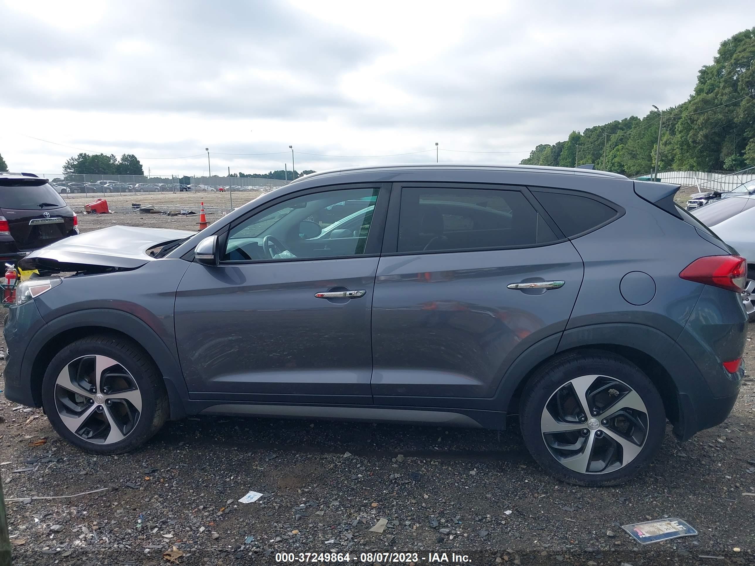 Photo 12 VIN: KM8J33A23GU216758 - HYUNDAI TUCSON 