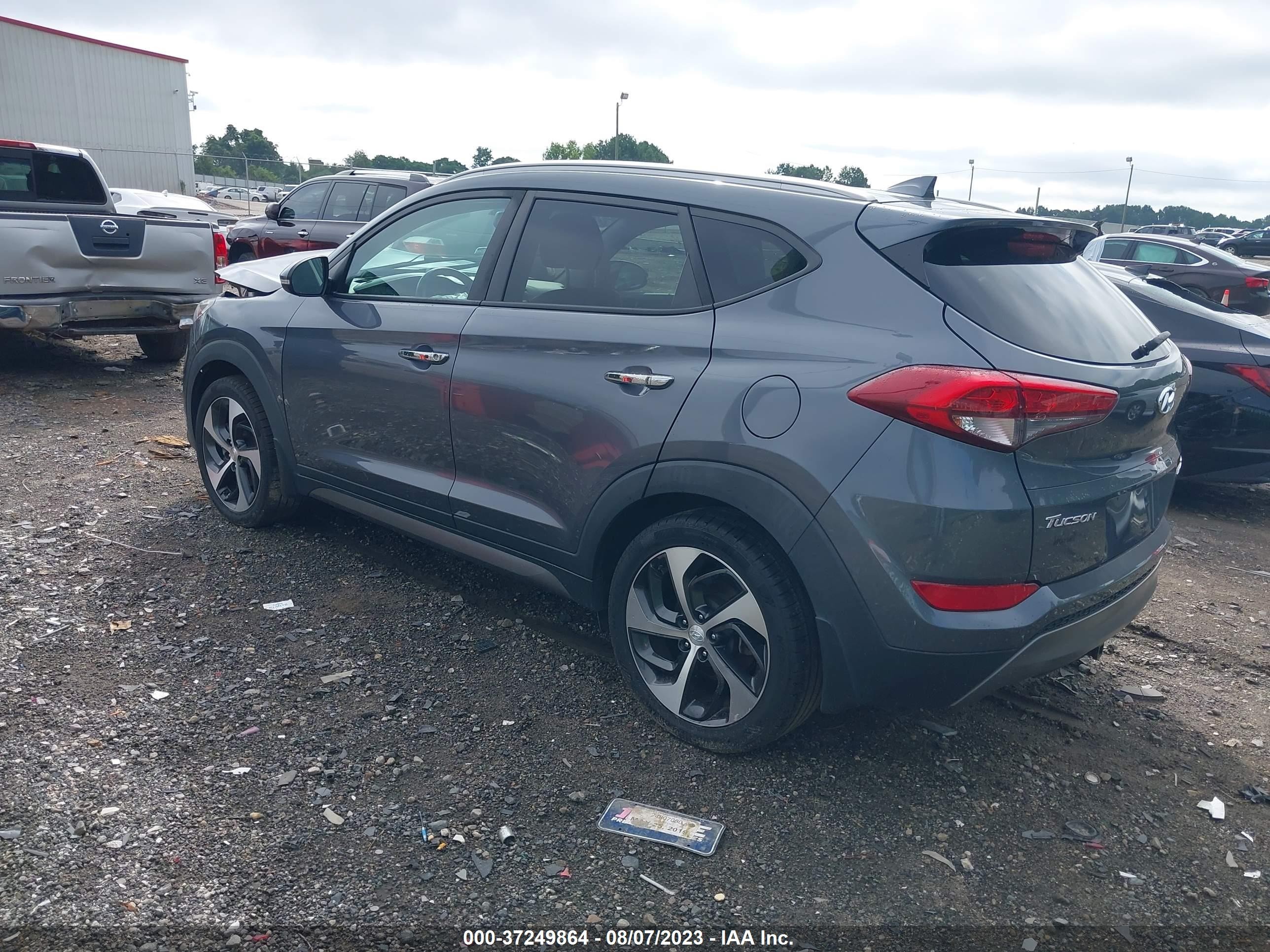 Photo 2 VIN: KM8J33A23GU216758 - HYUNDAI TUCSON 