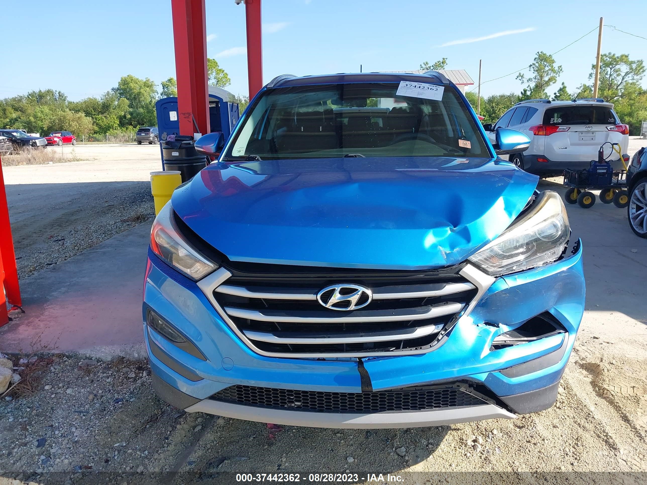 Photo 10 VIN: KM8J33A23HU480984 - HYUNDAI TUCSON 