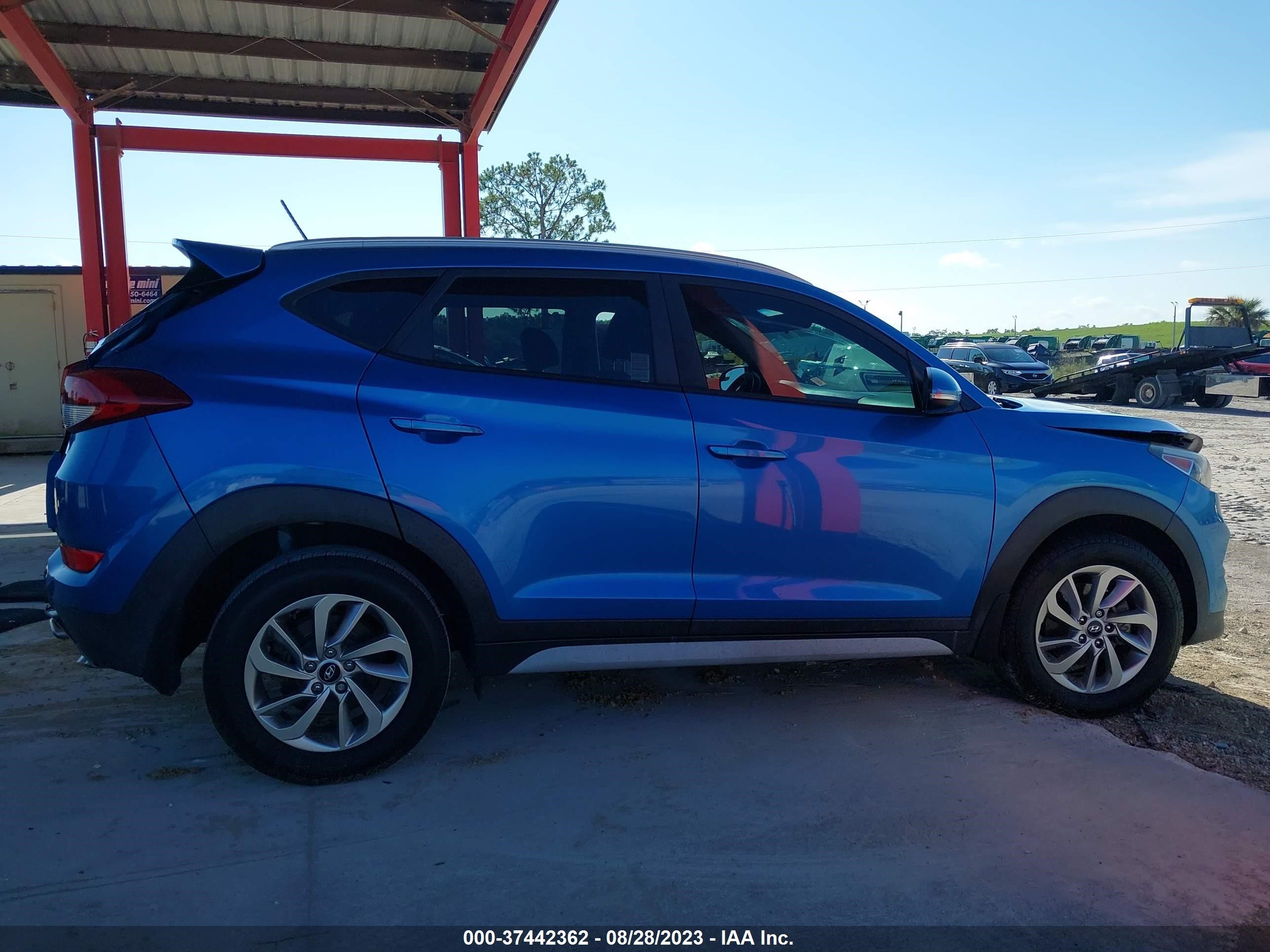 Photo 11 VIN: KM8J33A23HU480984 - HYUNDAI TUCSON 