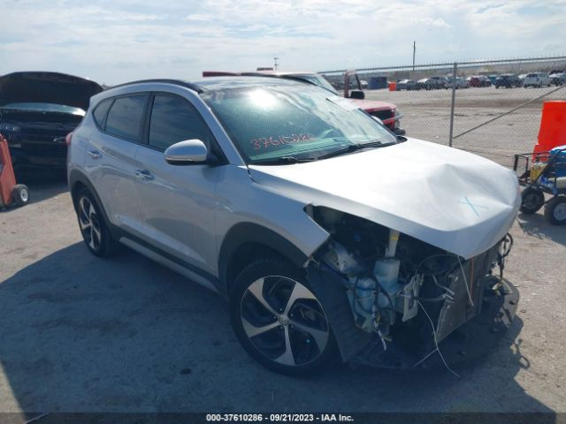 Photo 0 VIN: KM8J33A23HU586948 - HYUNDAI TUCSON 