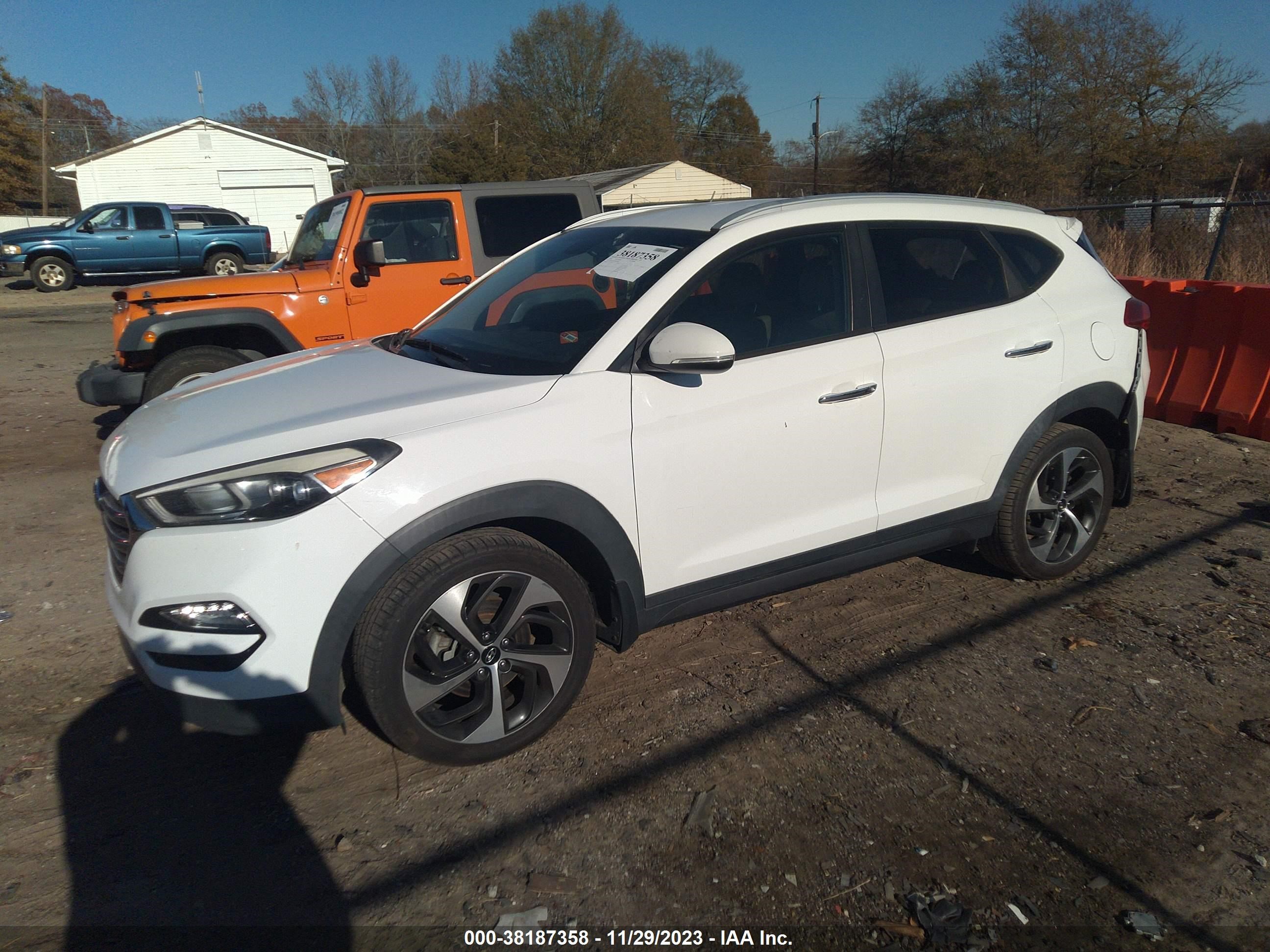 Photo 1 VIN: KM8J33A24GU030002 - HYUNDAI TUCSON 