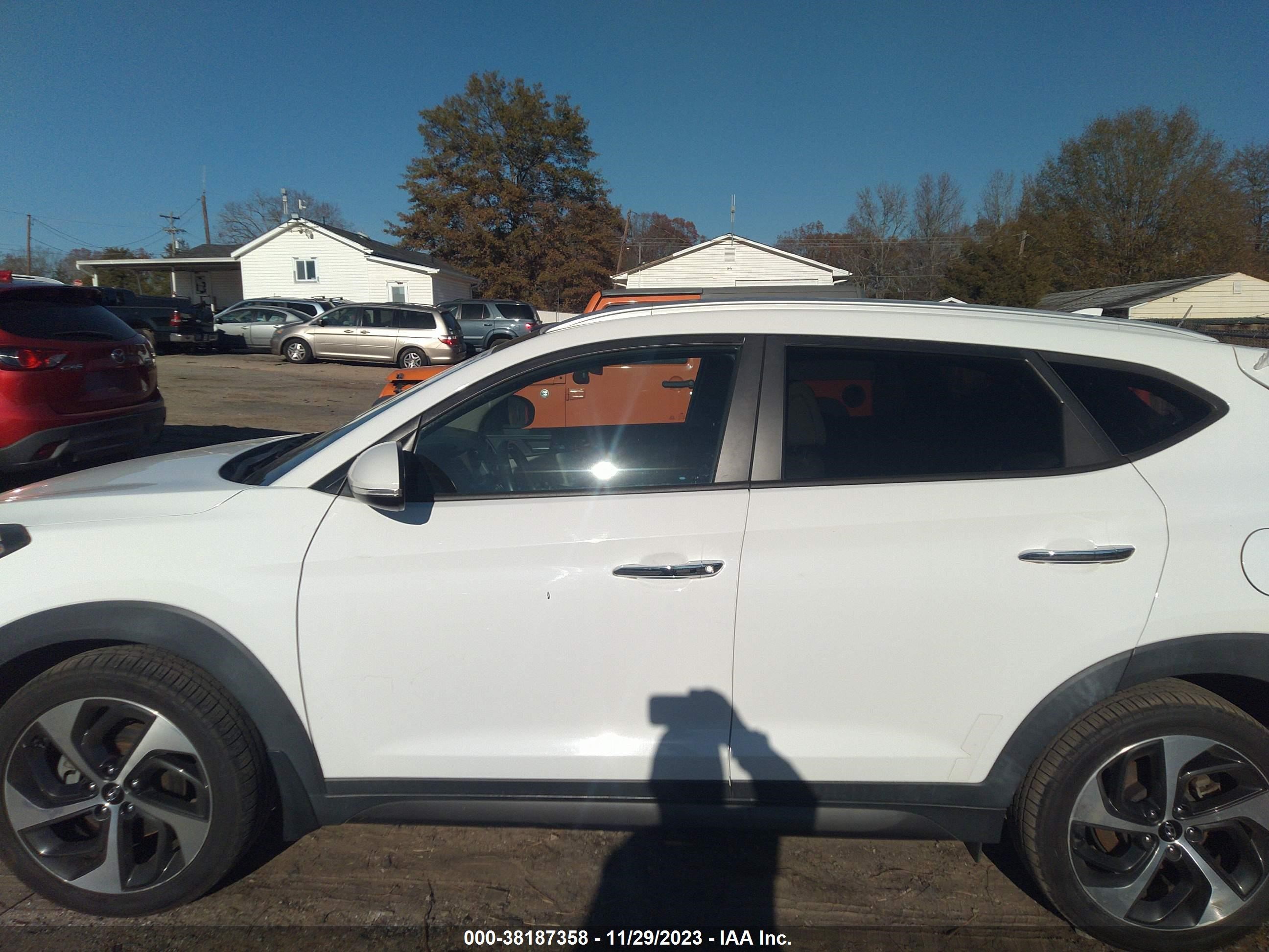 Photo 13 VIN: KM8J33A24GU030002 - HYUNDAI TUCSON 