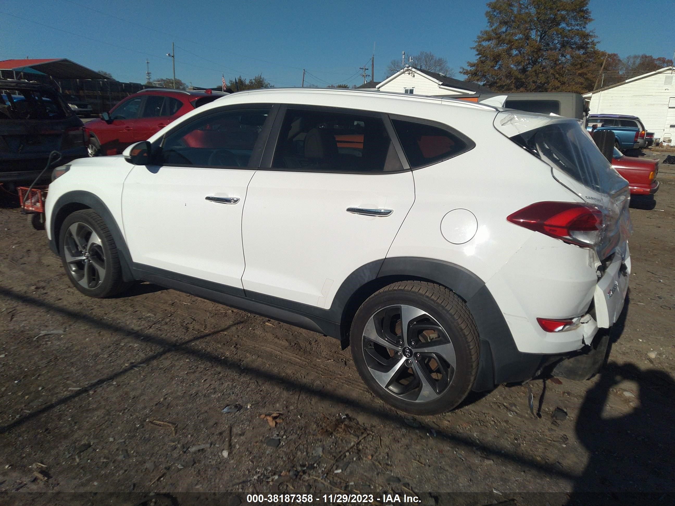 Photo 2 VIN: KM8J33A24GU030002 - HYUNDAI TUCSON 