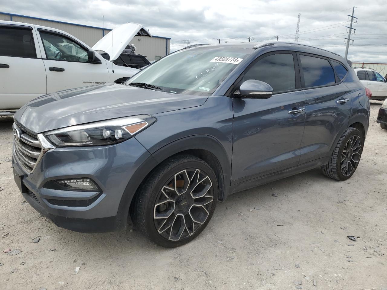 Photo 0 VIN: KM8J33A25GU182306 - HYUNDAI TUCSON 