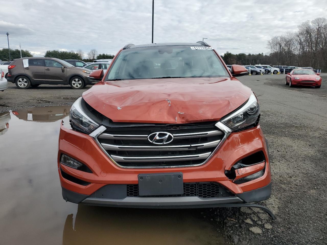 Photo 4 VIN: KM8J33A25GU186324 - HYUNDAI TUCSON 