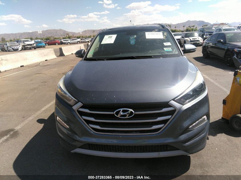 Photo 12 VIN: KM8J33A26JU625618 - HYUNDAI TUCSON 