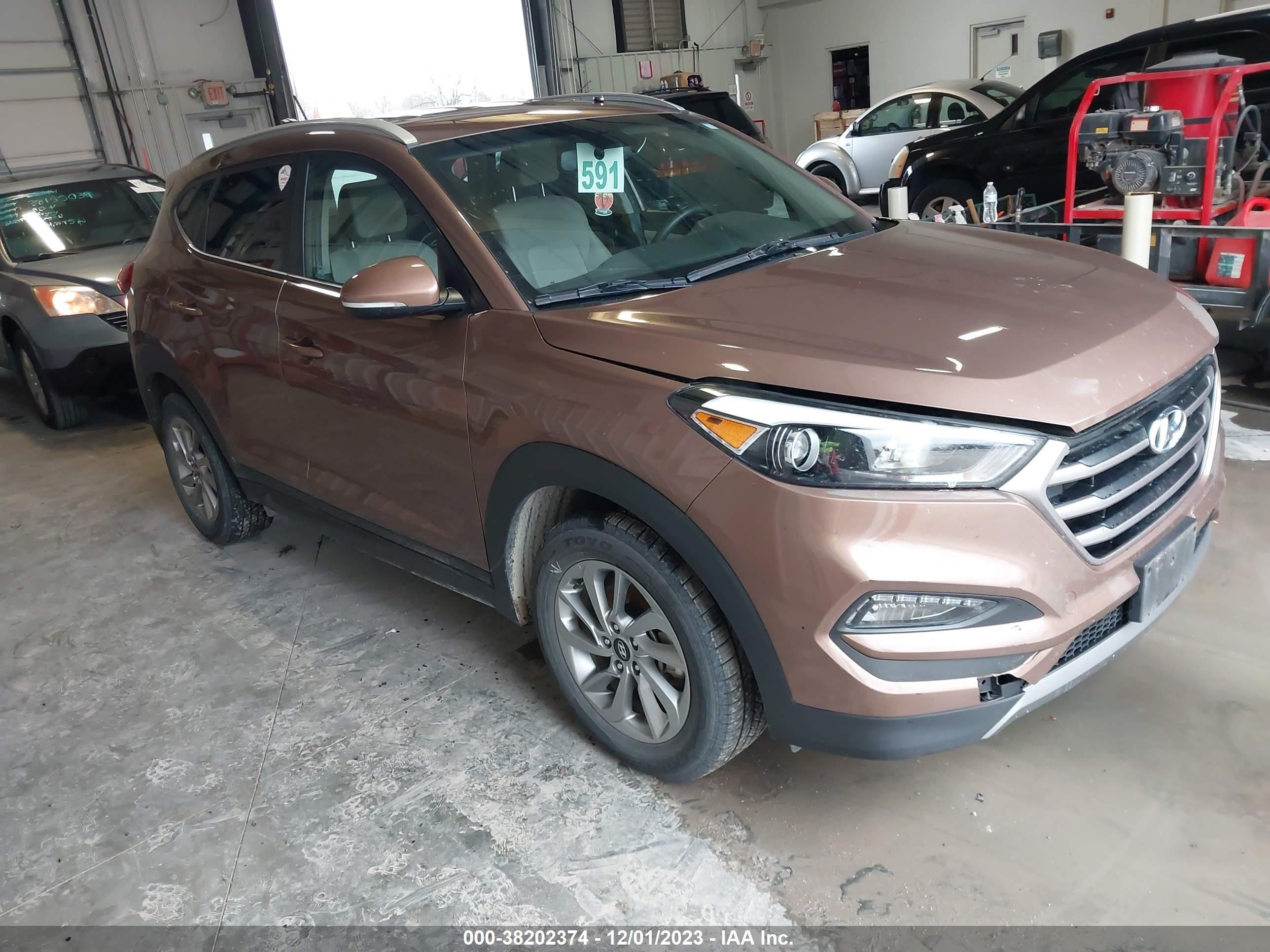 Photo 0 VIN: KM8J33A28GU187953 - HYUNDAI TUCSON 