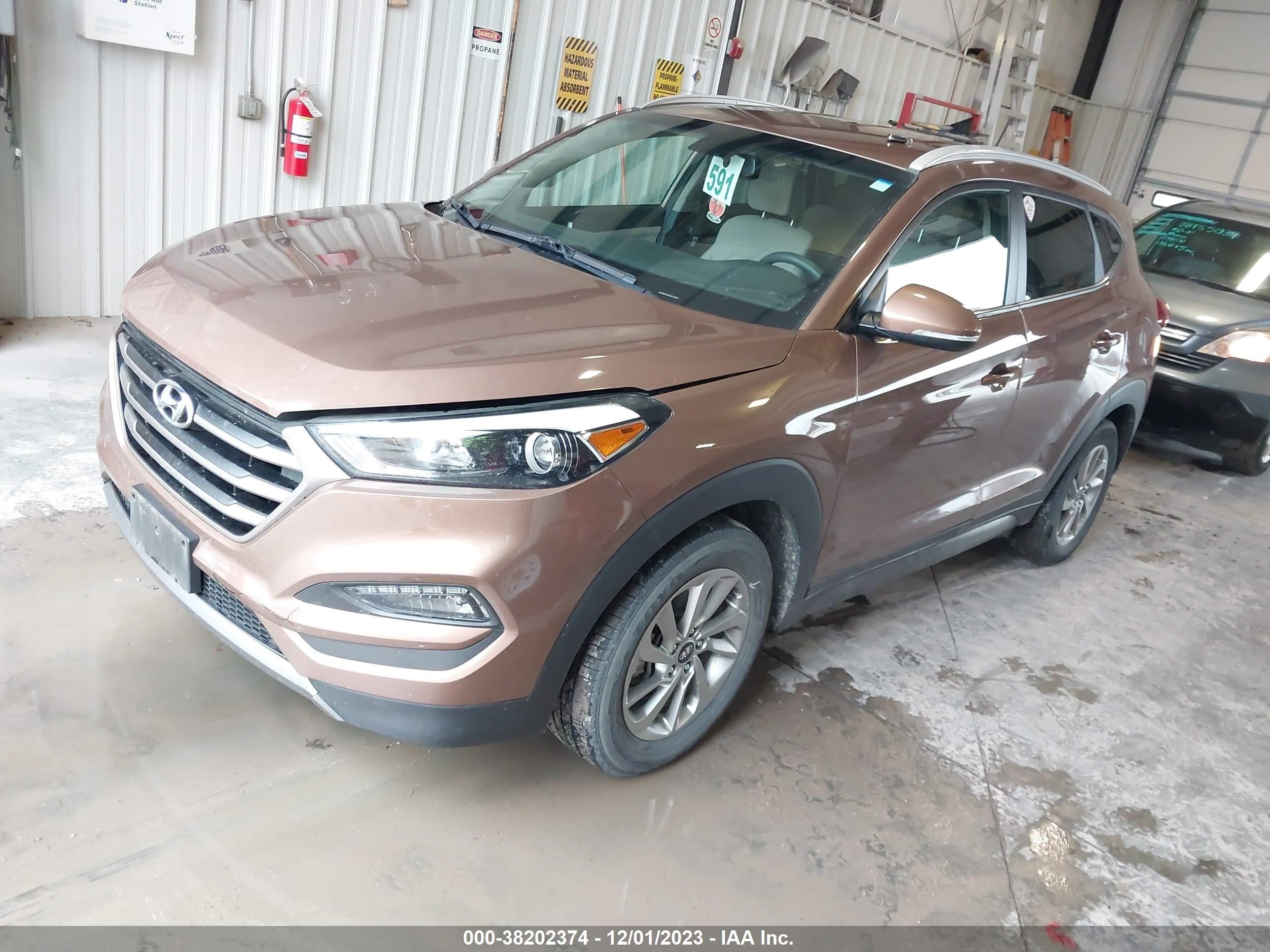 Photo 1 VIN: KM8J33A28GU187953 - HYUNDAI TUCSON 