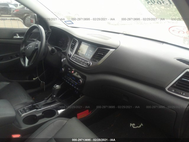 Photo 4 VIN: KM8J33A2XGU121663 - HYUNDAI TUCSON 