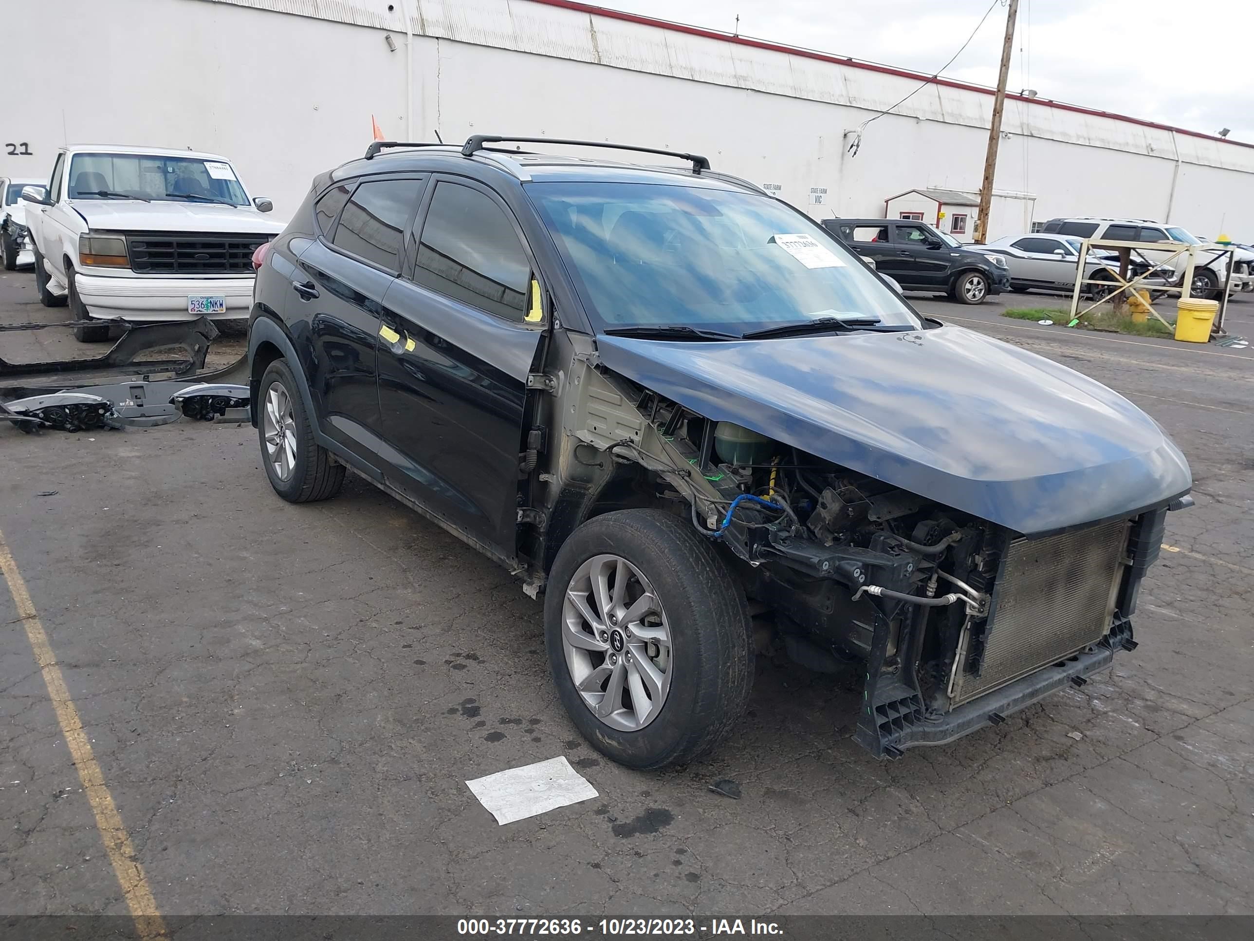 Photo 0 VIN: KM8J33A40GU056100 - HYUNDAI TUCSON 