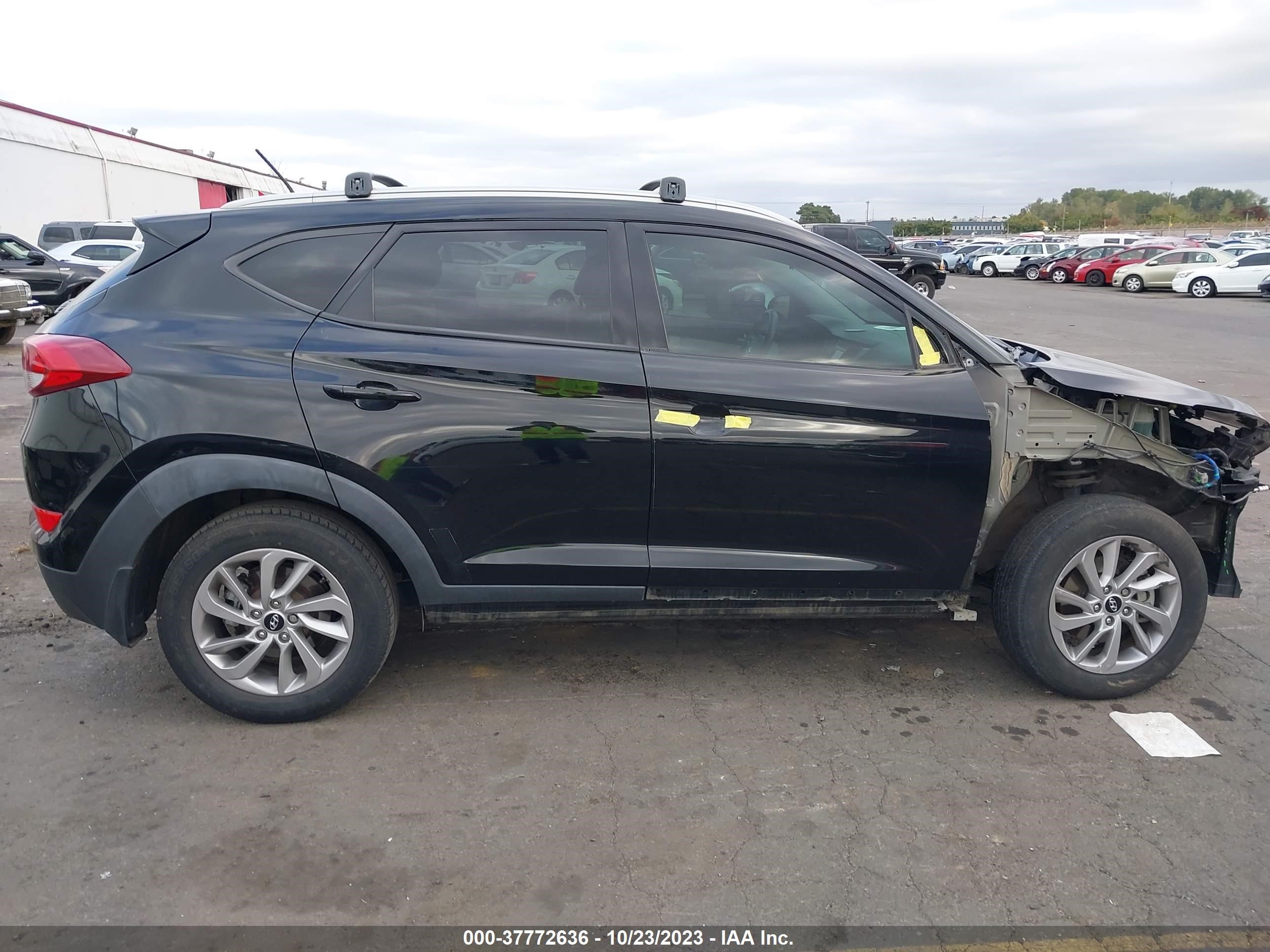 Photo 13 VIN: KM8J33A40GU056100 - HYUNDAI TUCSON 