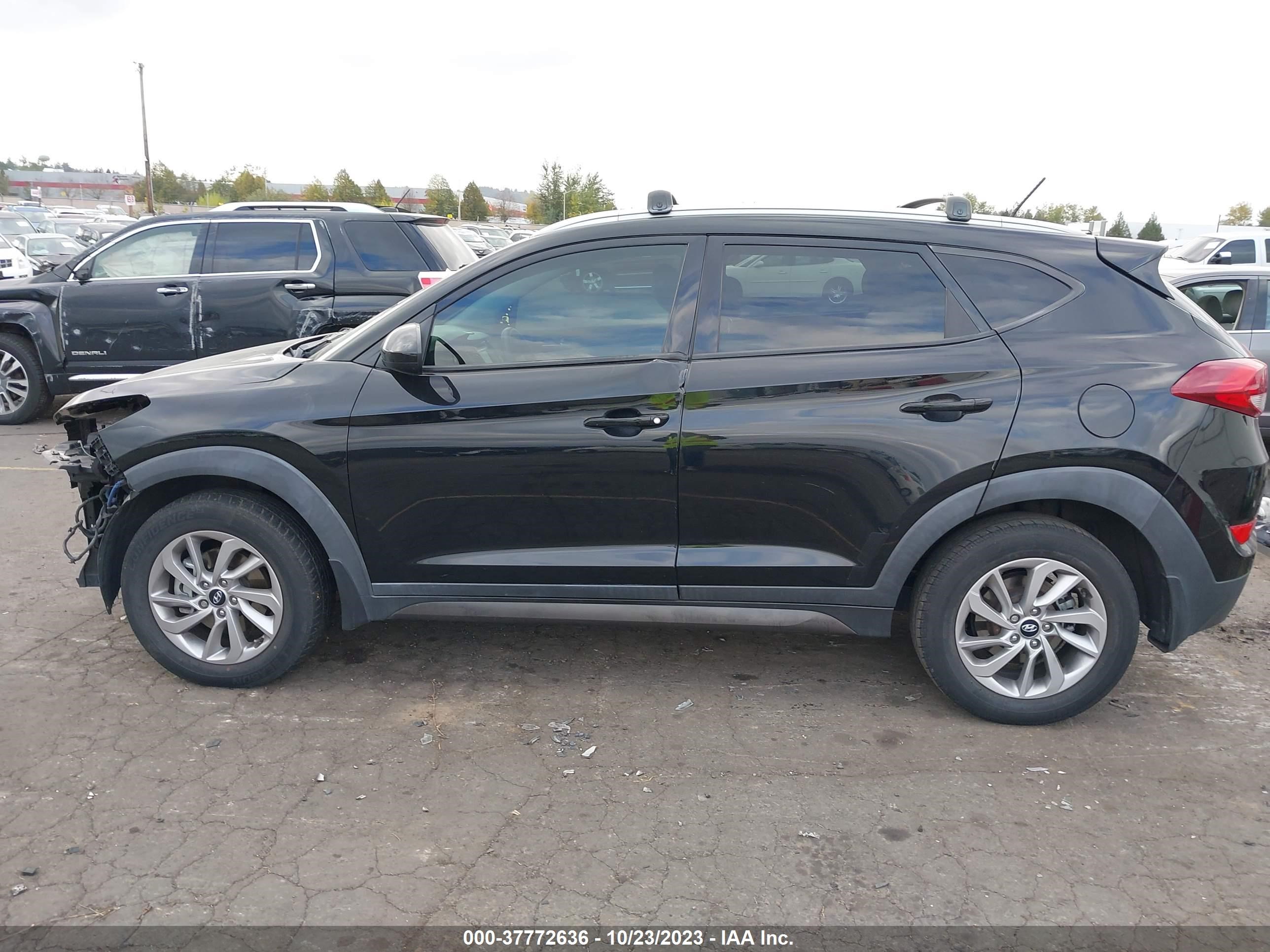 Photo 14 VIN: KM8J33A40GU056100 - HYUNDAI TUCSON 