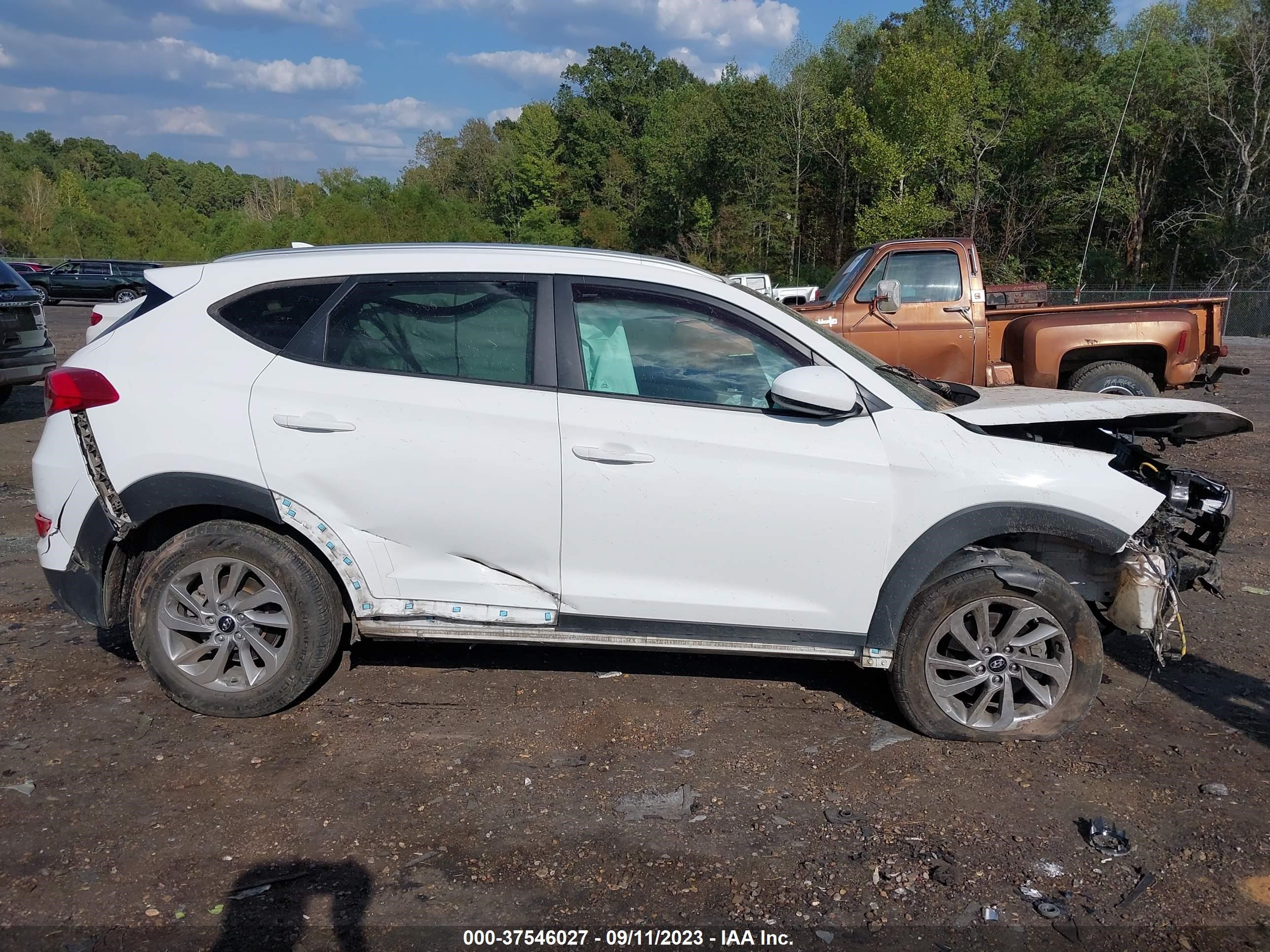 Photo 12 VIN: KM8J33A41JU804151 - HYUNDAI TUCSON 