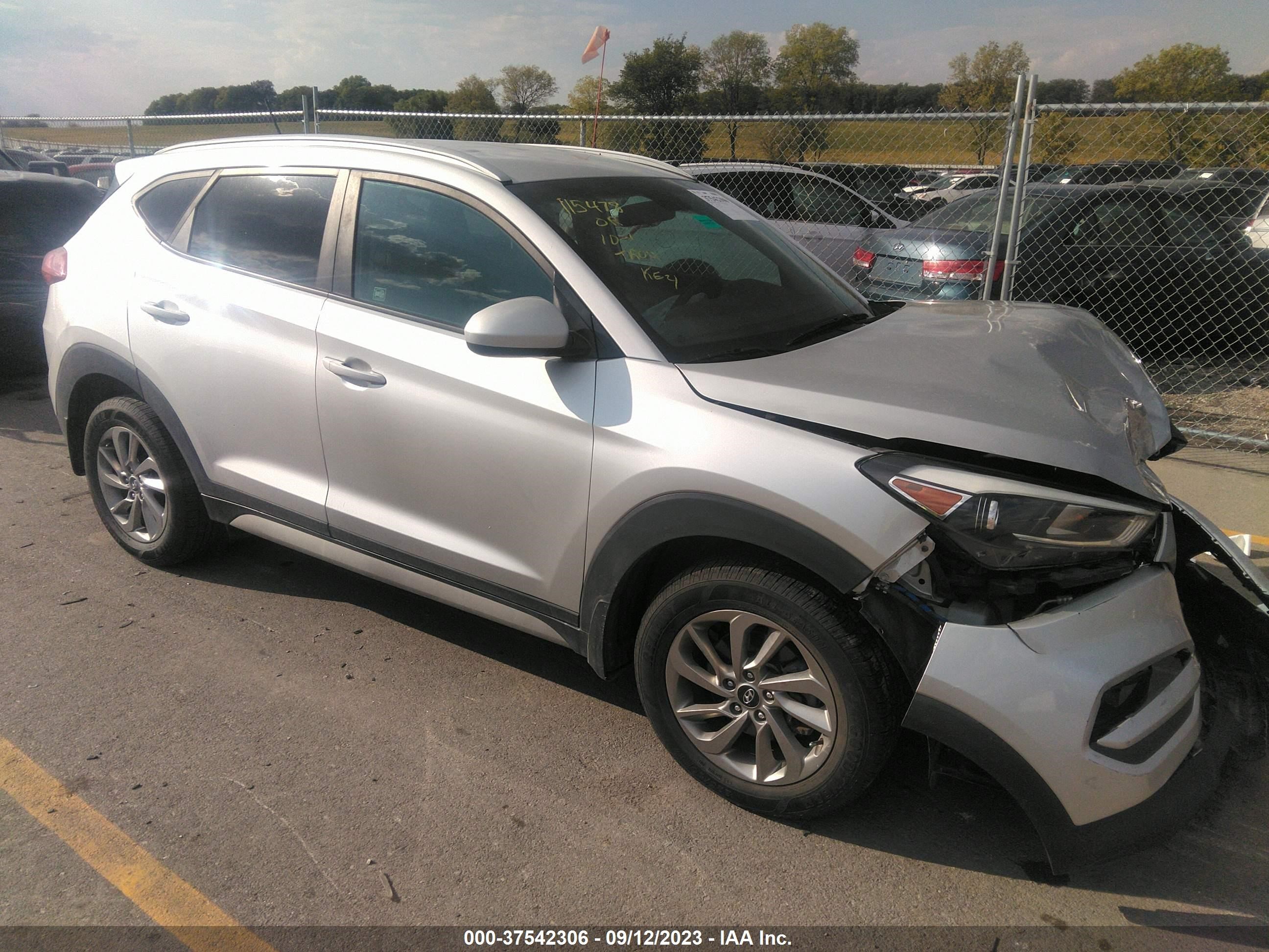 Photo 12 VIN: KM8J33A42HU567454 - HYUNDAI TUCSON 