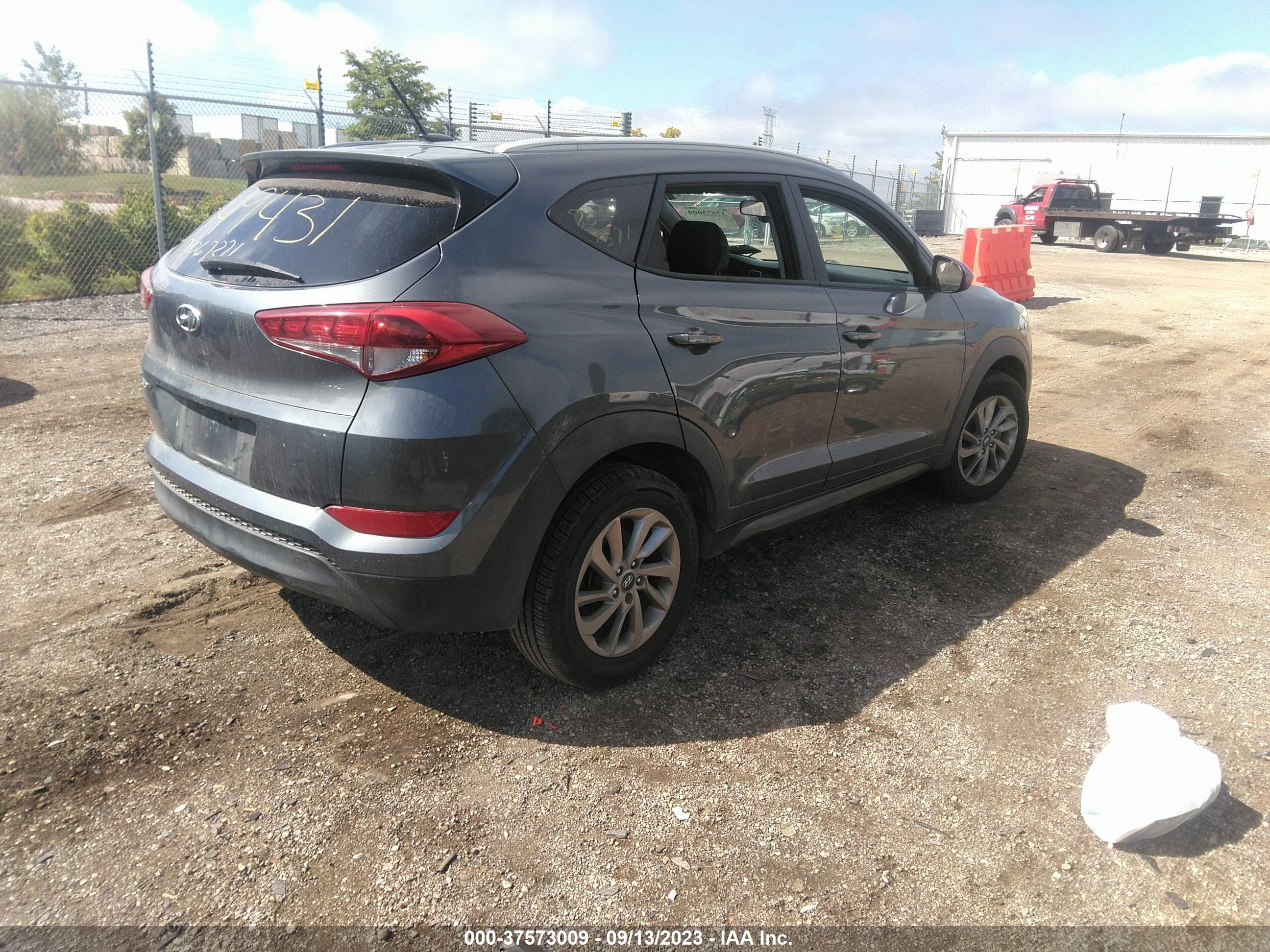 Photo 3 VIN: KM8J33A43GU114006 - HYUNDAI TUCSON 