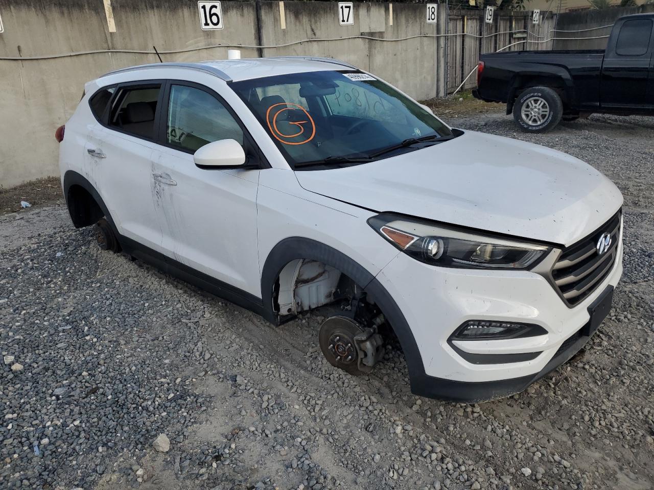 Photo 3 VIN: KM8J33A44GU027005 - HYUNDAI TUCSON 