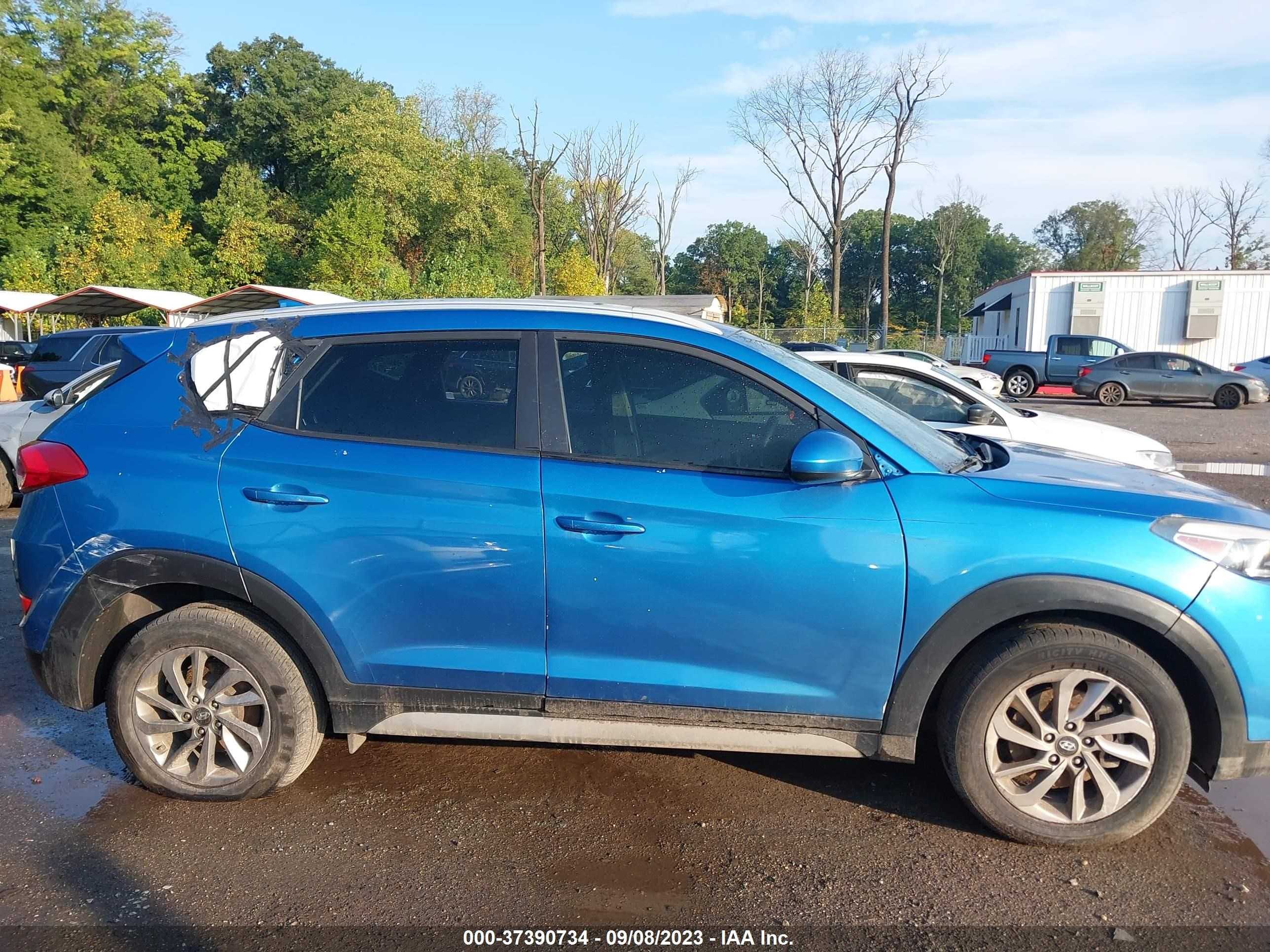 Photo 11 VIN: KM8J33A44JU662037 - HYUNDAI TUCSON 