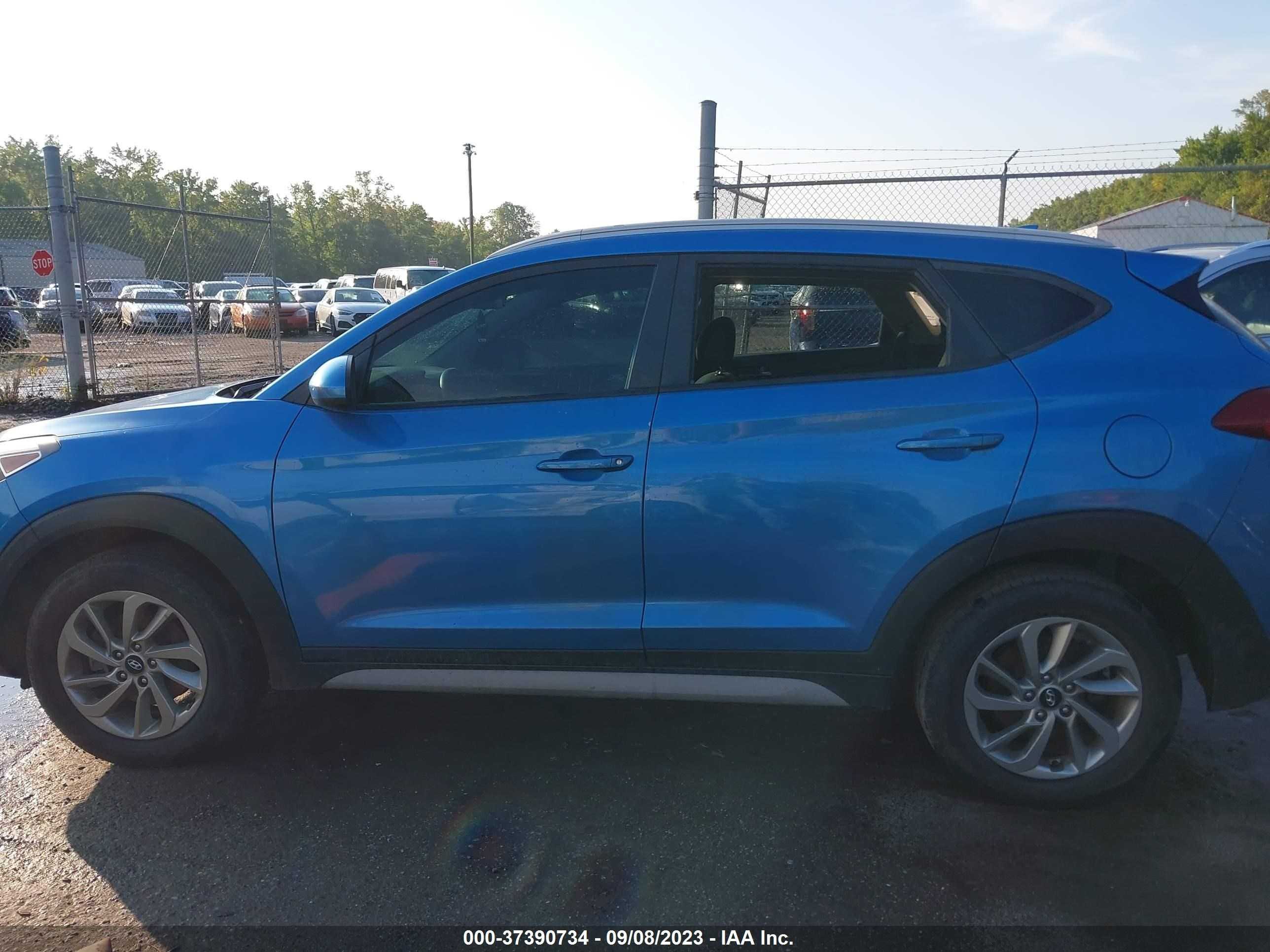 Photo 12 VIN: KM8J33A44JU662037 - HYUNDAI TUCSON 