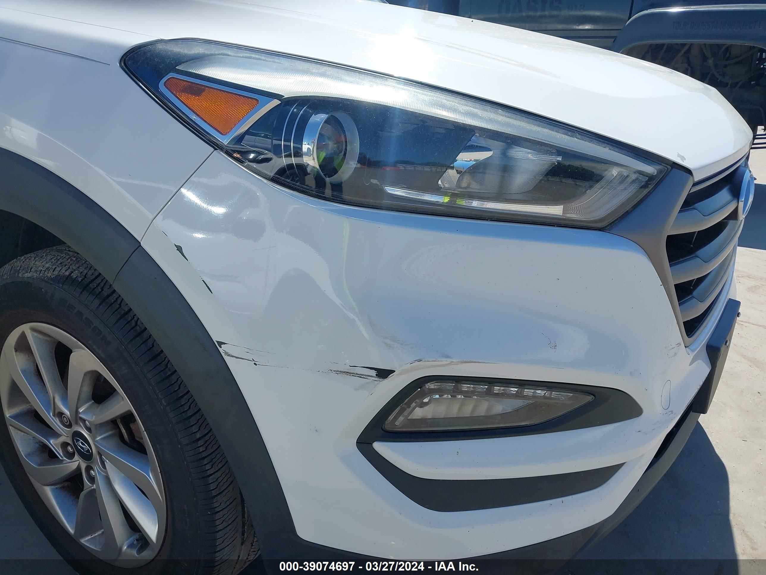 Photo 10 VIN: KM8J33A45GU041253 - HYUNDAI TUCSON 